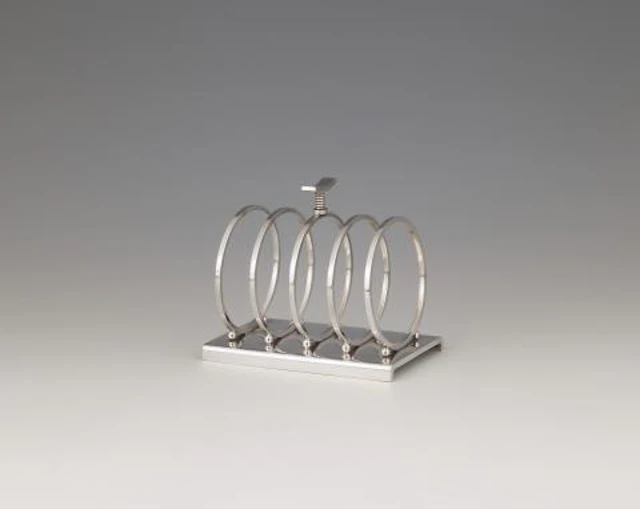 A rare Georg Jensen silver toast stand no. 824 designed by Sigvard Bernadotte