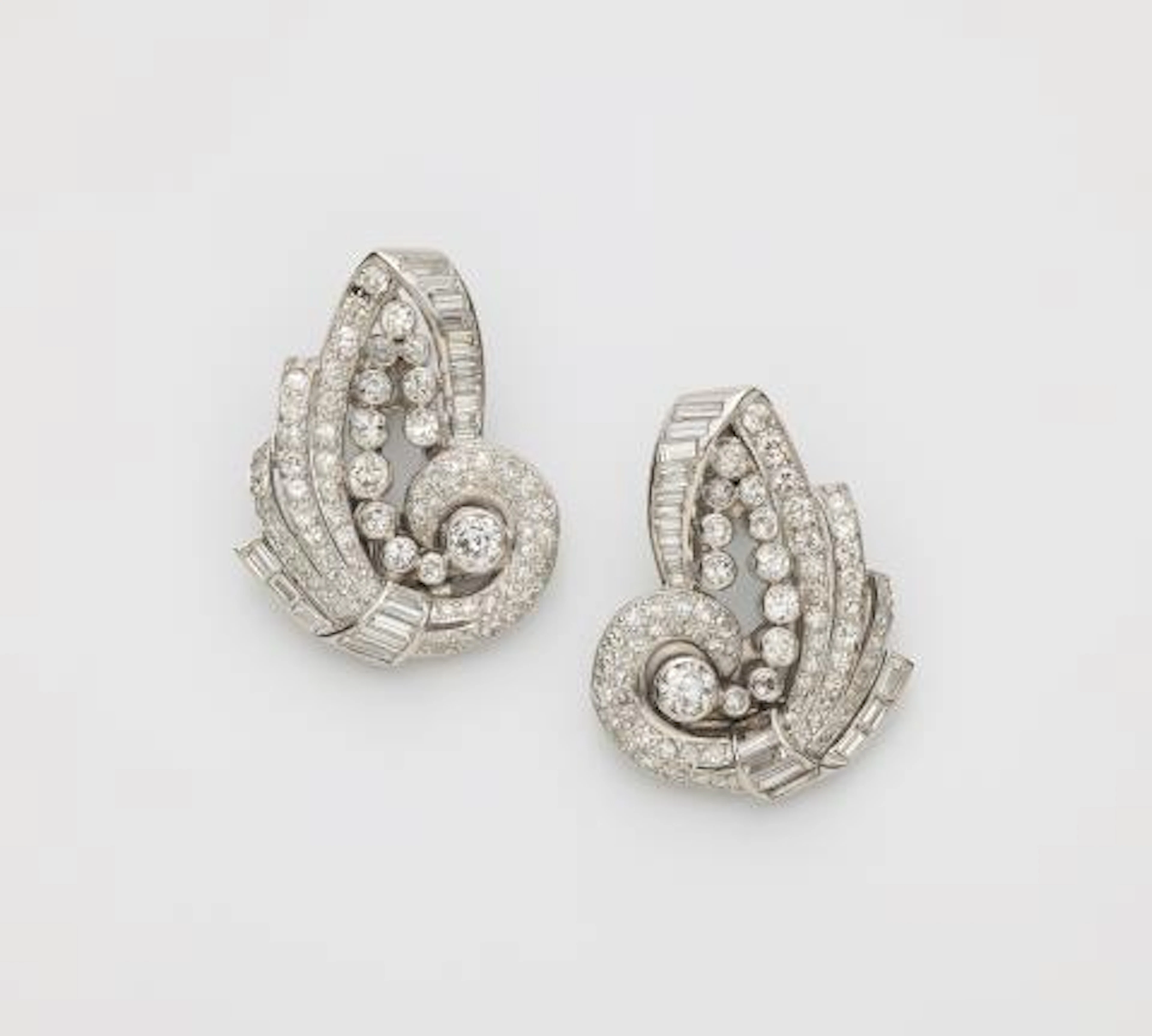 A pair of 14k white gold and diamond Retro Style dress clips, also