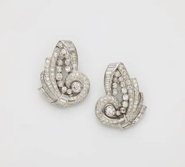 A pair of 14k white gold and diamond Retro Style dress clips, also