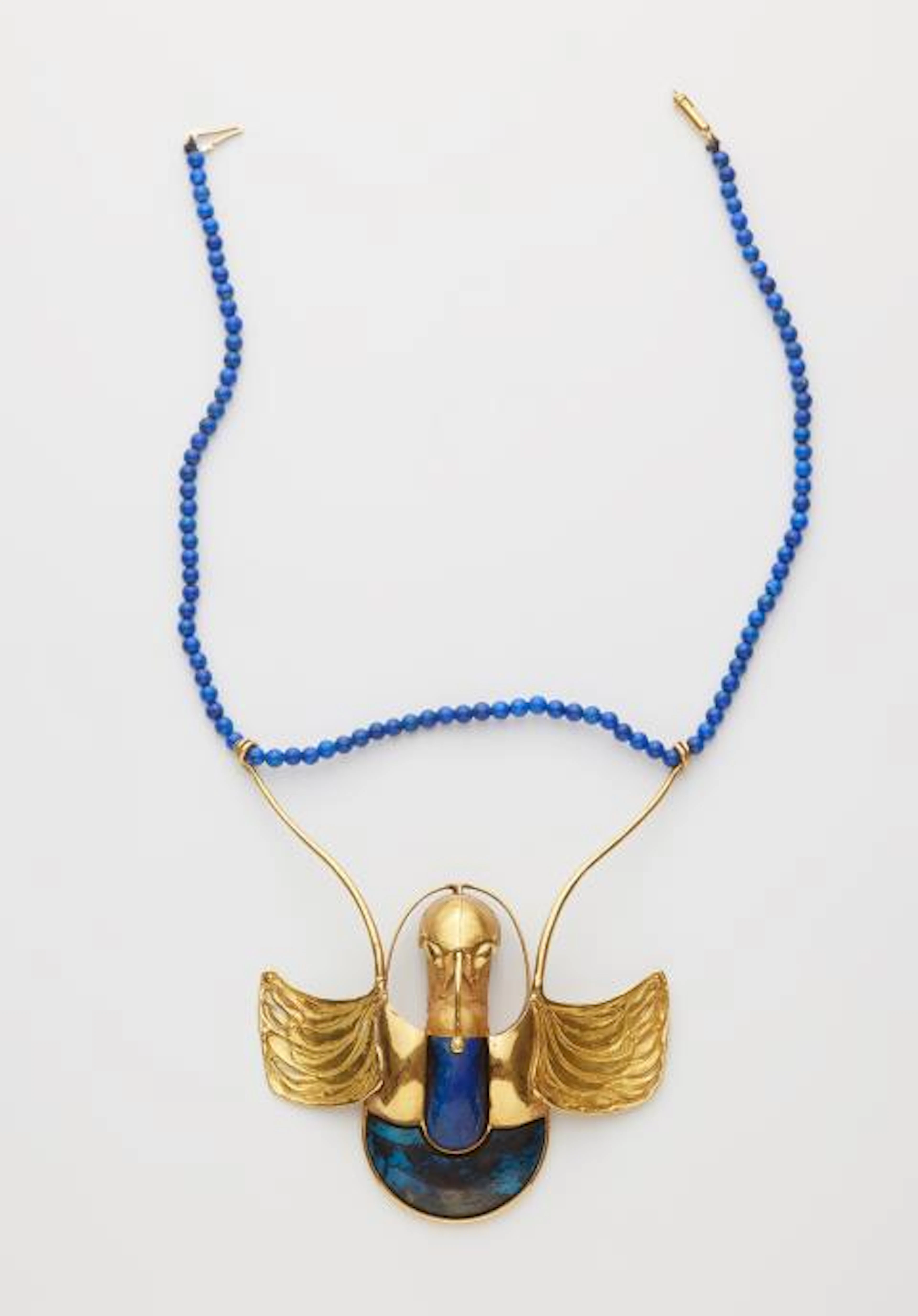 A one of a kind hand-forged 18k gold and lapis lazuli sculptural artist's