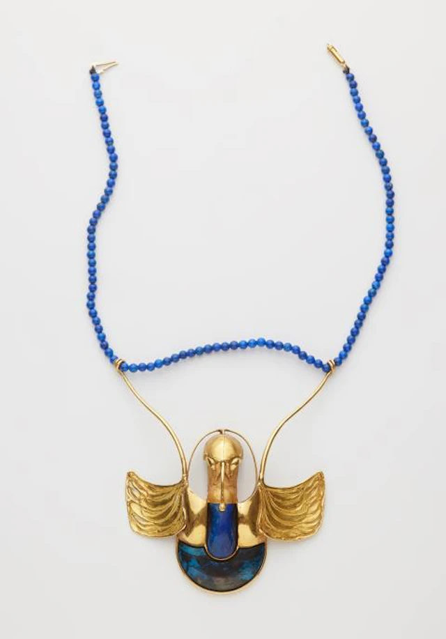 A one of a kind hand-forged 18k gold and lapis lazuli sculptural artist's