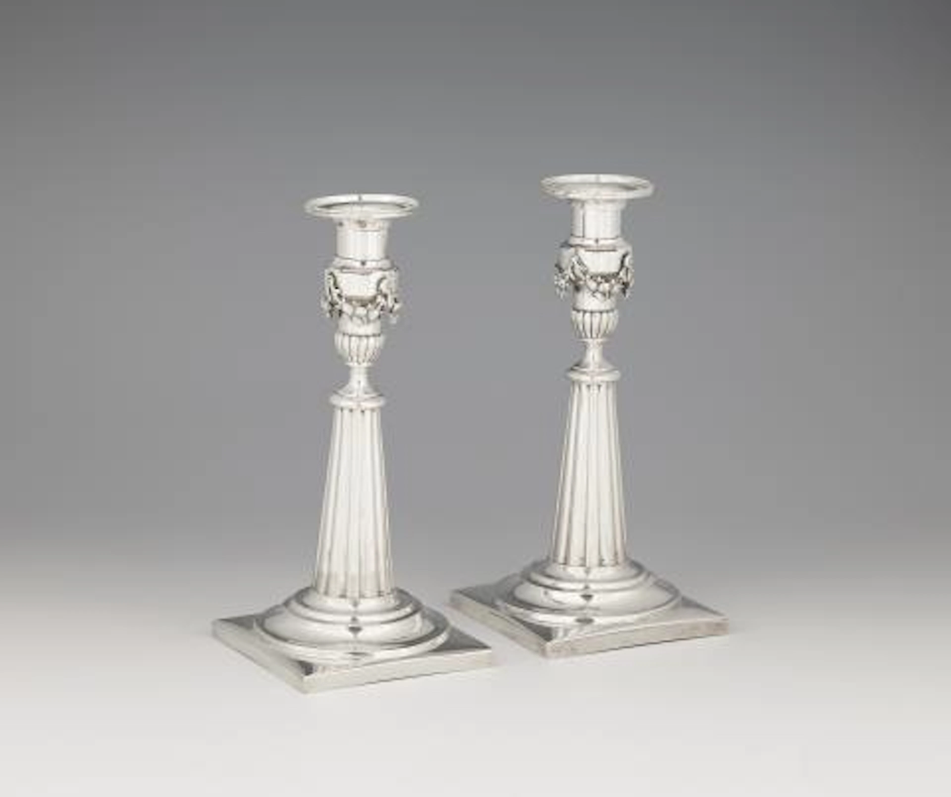 A pair of Augsburg silver candlesticks