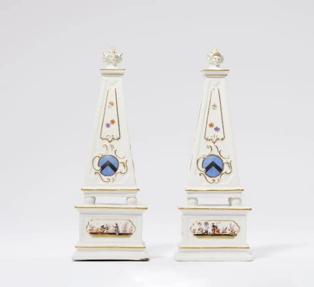 Two rare Meissen porcelain obelisks bearing the Brühl coat of arms