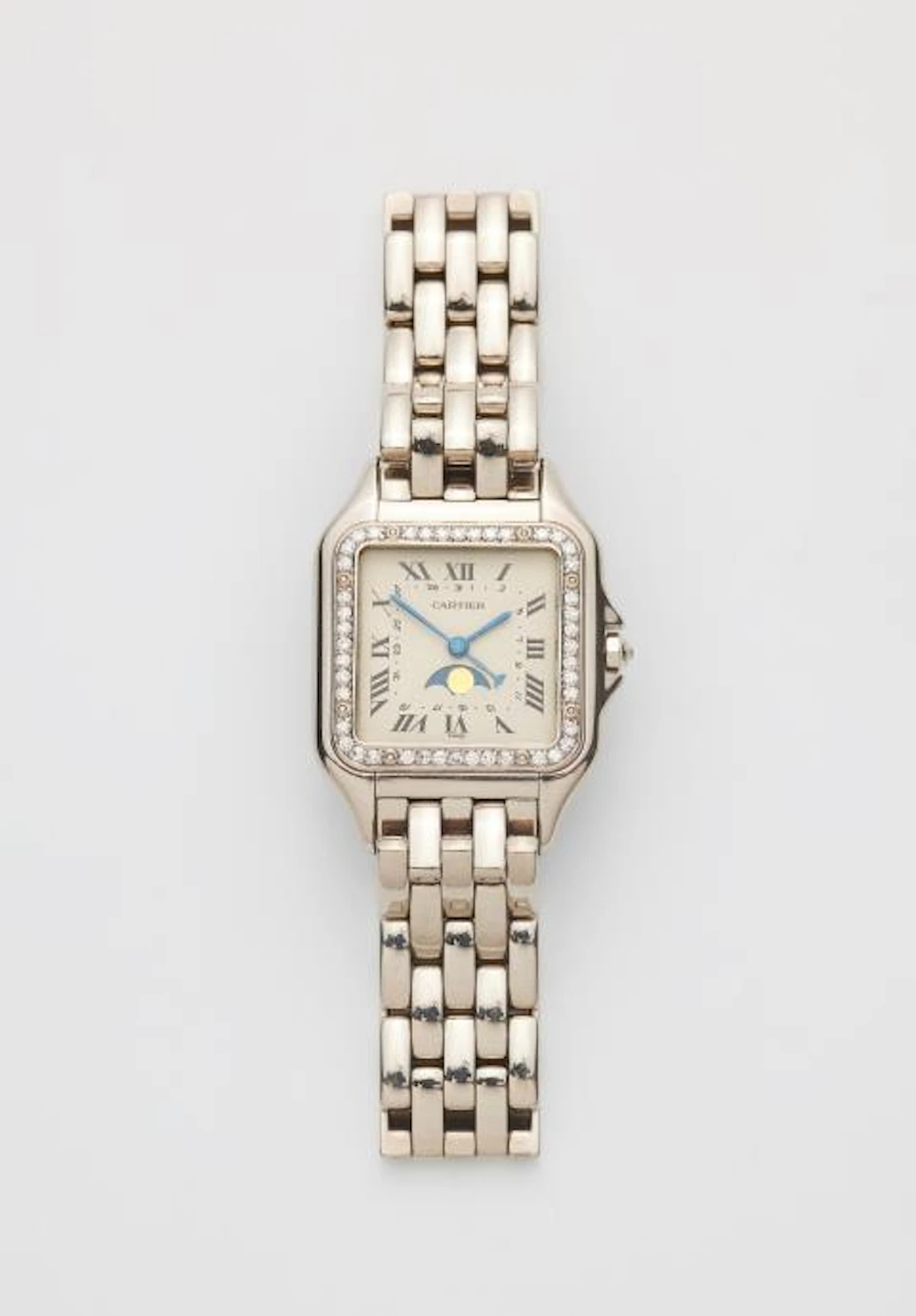 An 18k white gold Cartier Panthére lady's wristwatch with moon phases.