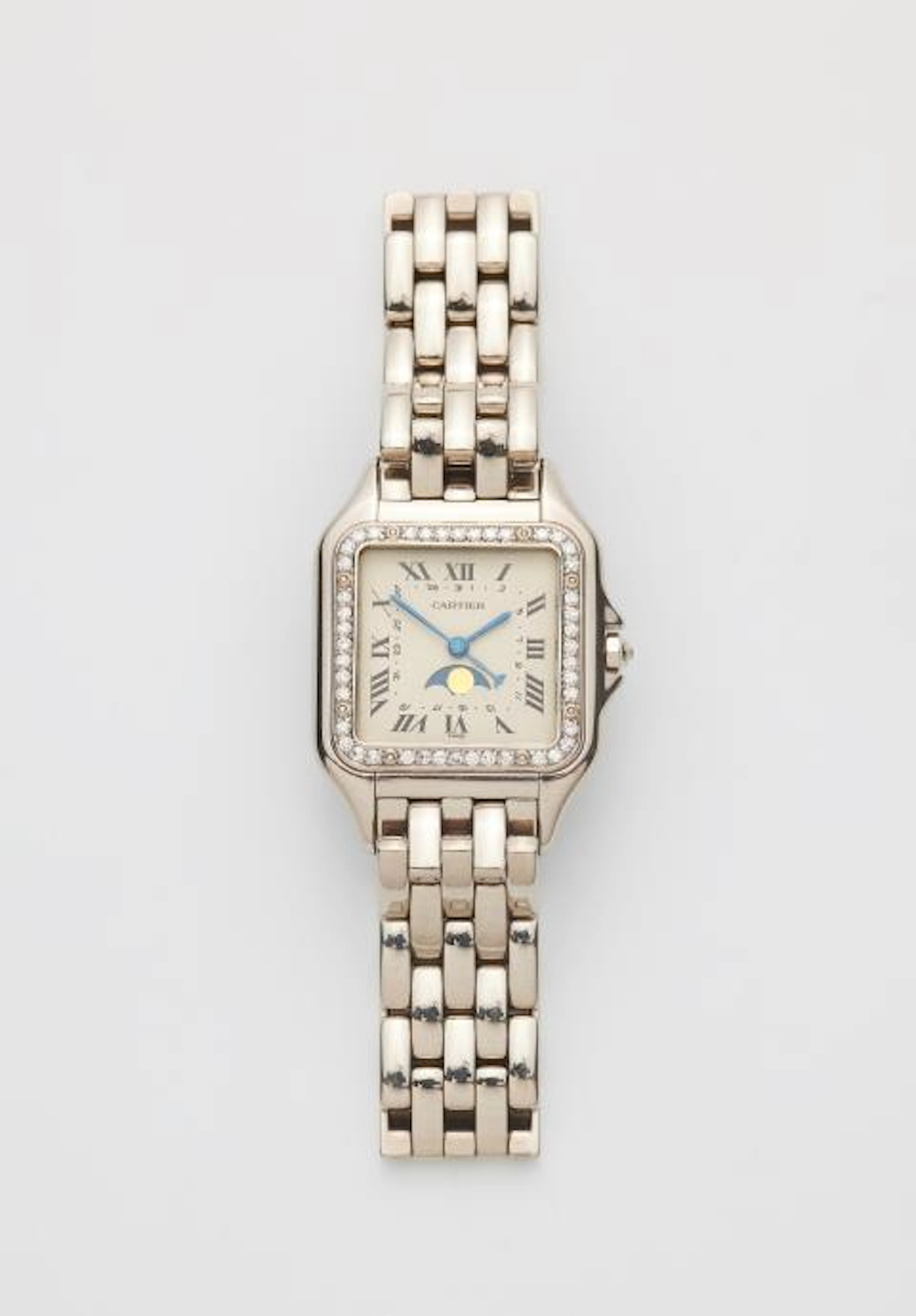 An 18k white gold Cartier Panthére lady's wristwatch with moon phases.