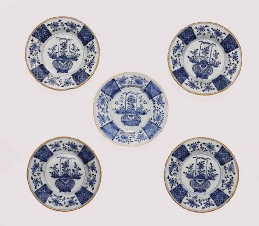 Five Dutch Delft faience plates with Chinoiserie flower basket motifs