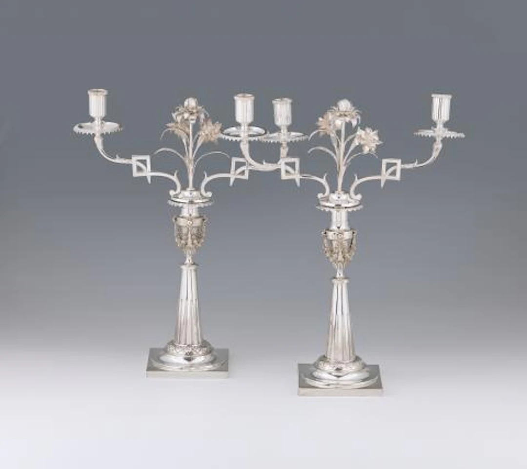 A pair of Augsburg silver candelabra