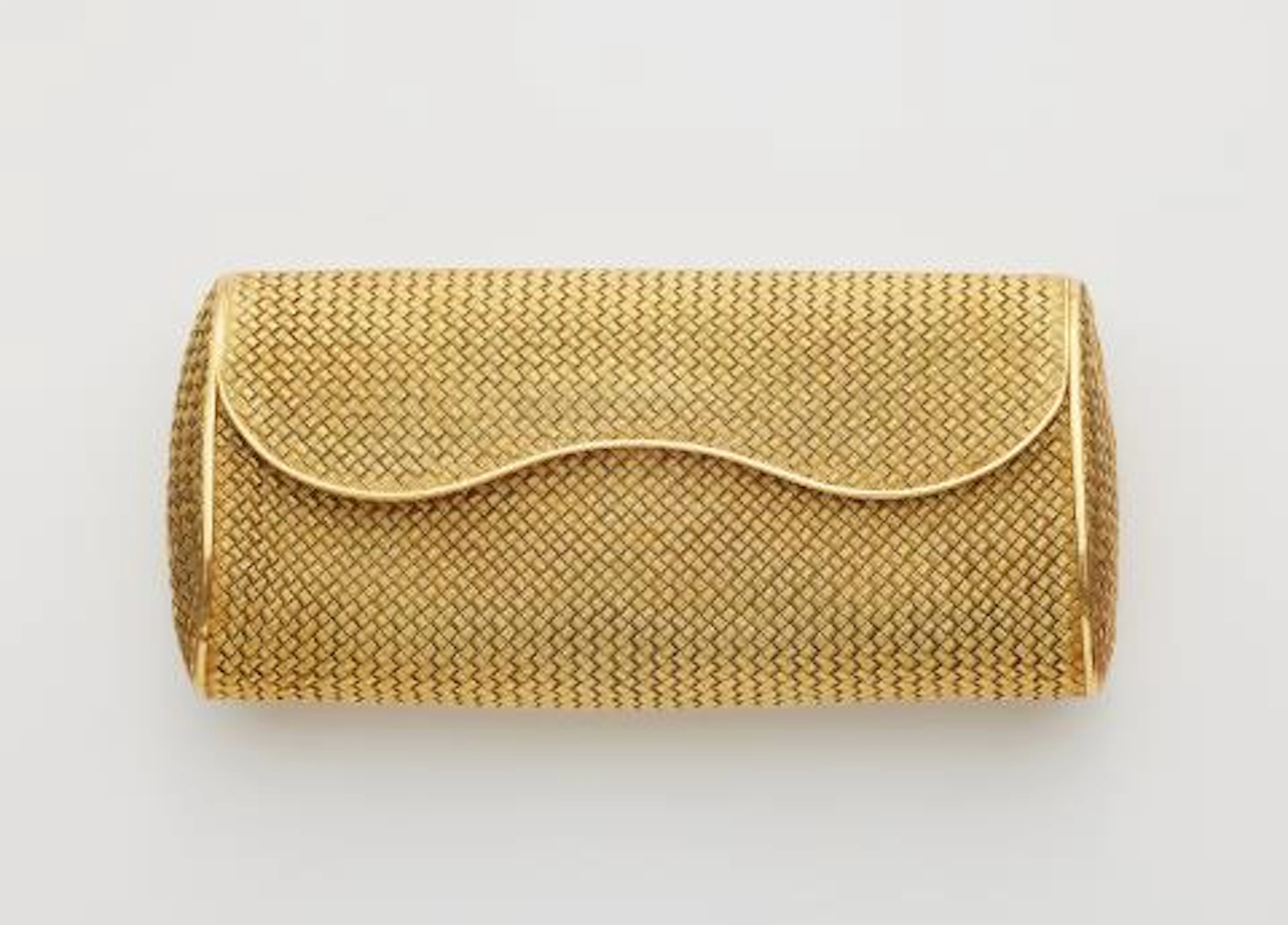 An 18k yellow gold basketwork evening clutch.