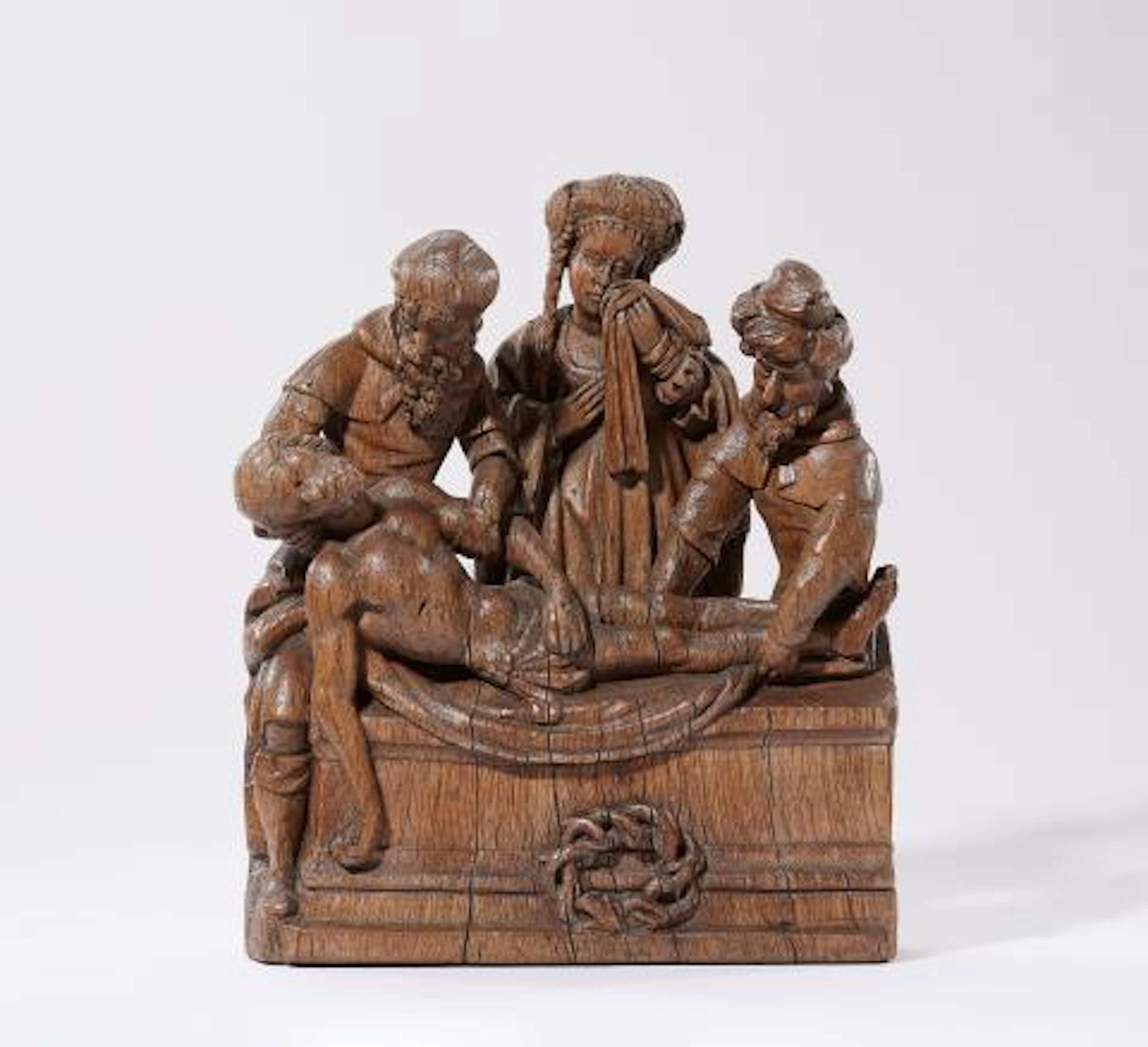 A carved oak Entombment relief