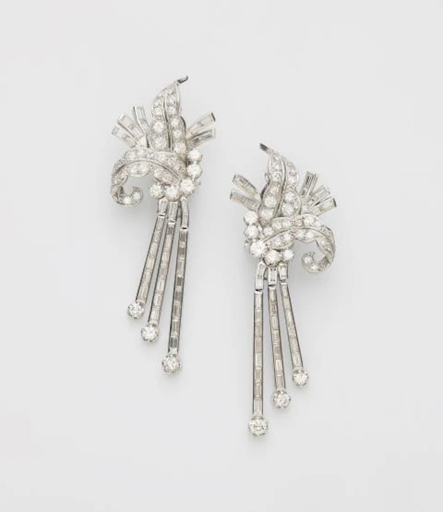 A pair of 14k white gold and diamond cocktail clip earrings with detachable