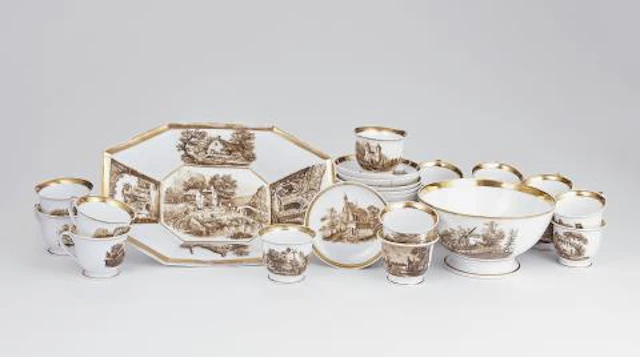 A porcelain anniversary service with Dutch landscapes