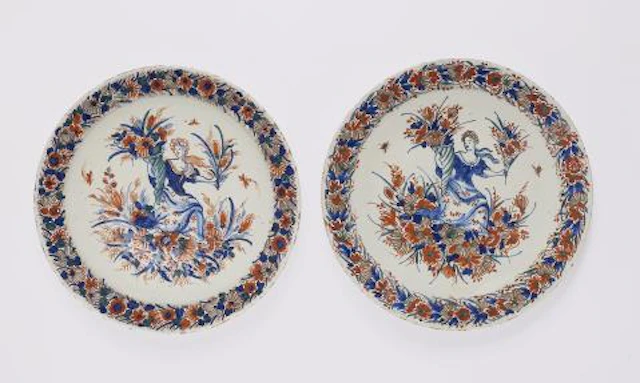 Two Dutch Delft faience plates depicting the allegory of Flora