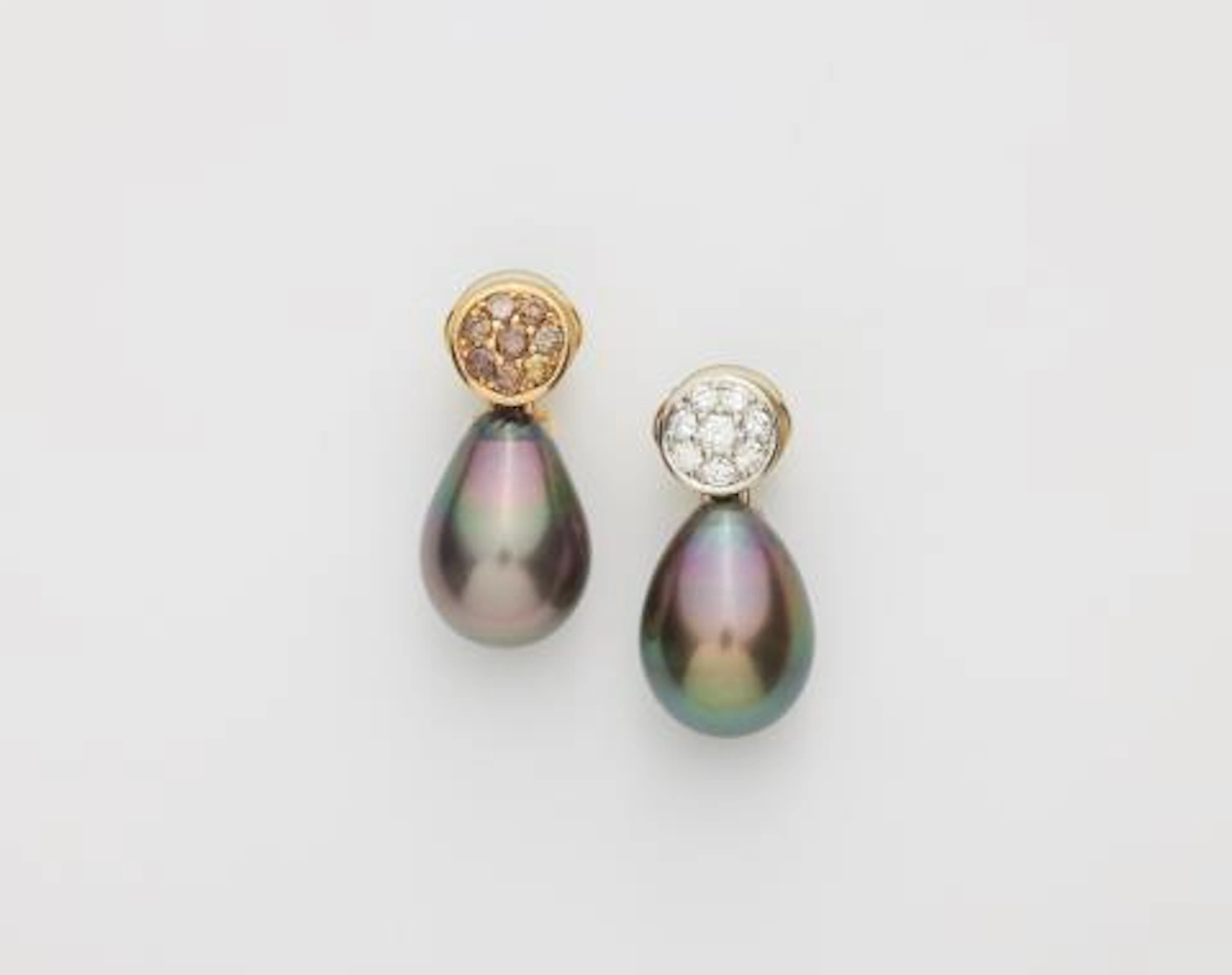 A pair of 18k gold platinum coloured diamond and Tahiti pearl droplet earrings.