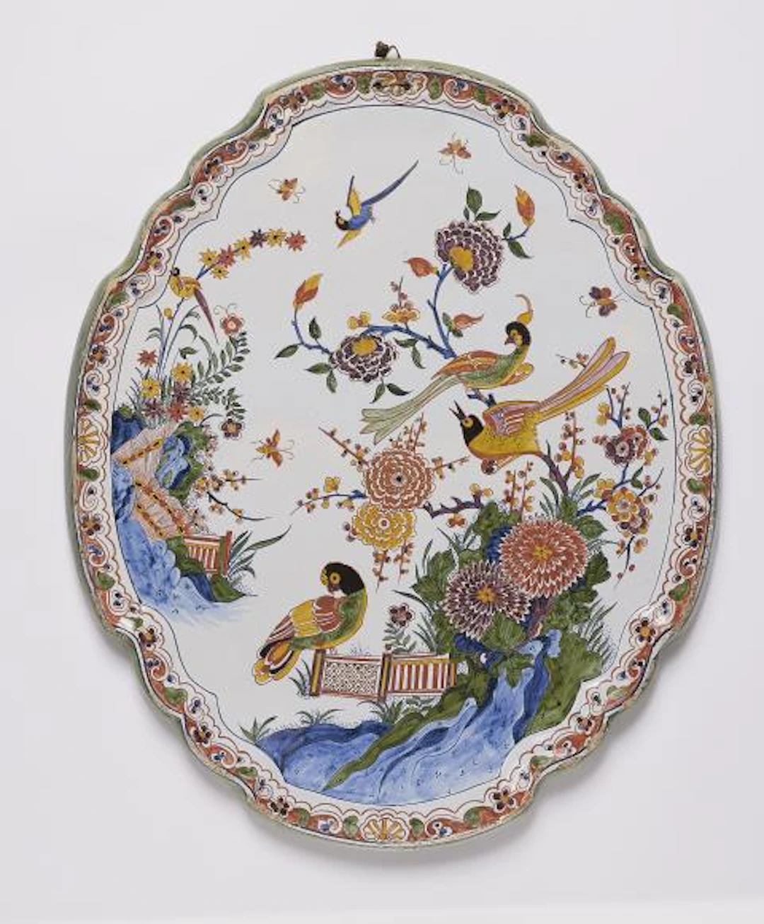 A large Dutch Delft faience plaque with Chinoiserie decor