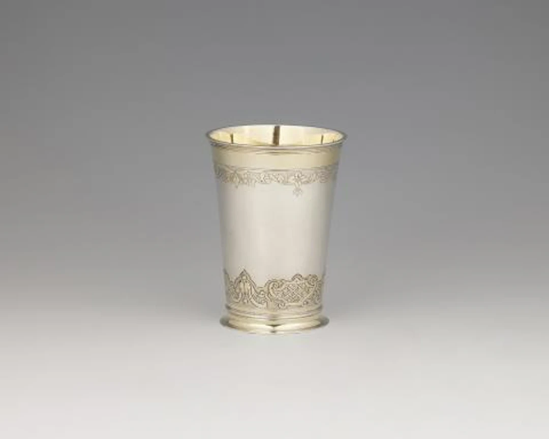 An Augsburg parcel-gilt Régence silver beaker