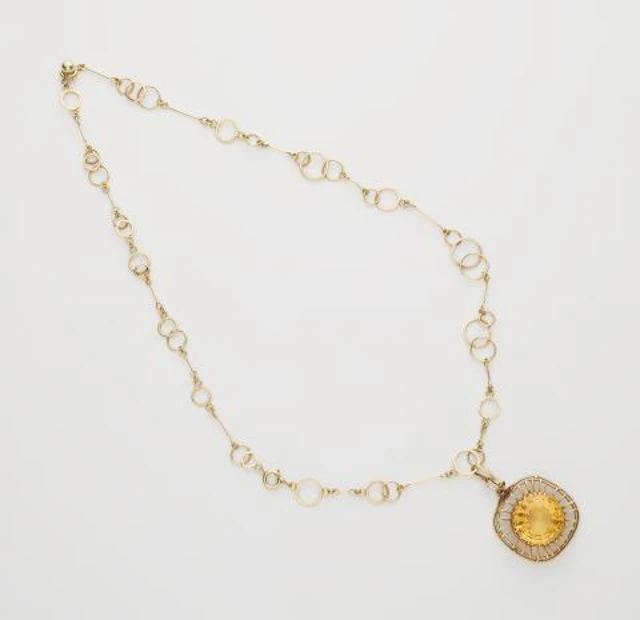 A German 14k gold and golden topaz adjustable necklace.