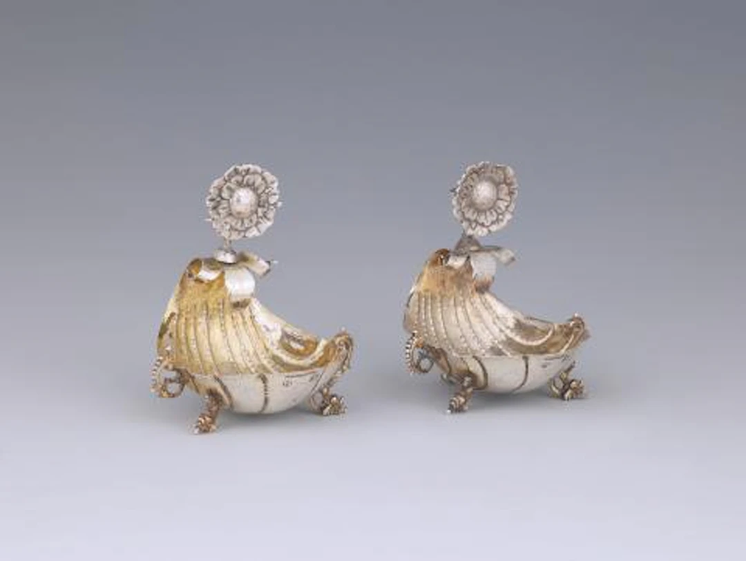 A pair of silver, partially gilt Renaissance salt cellars.
