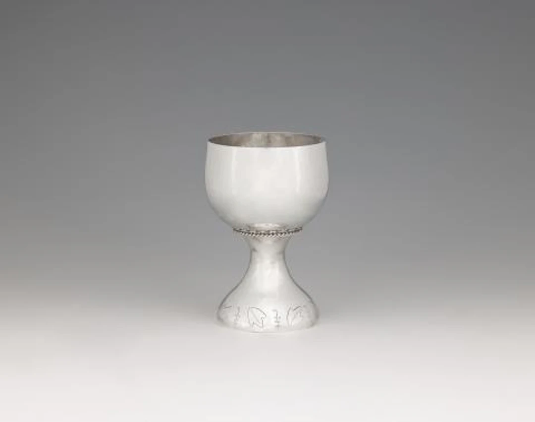 A small Art Deco silver wine goblet