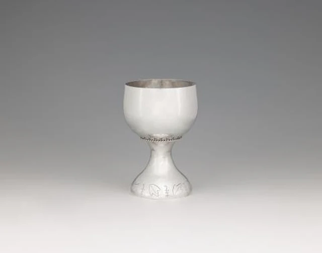 A small Art Deco silver wine goblet