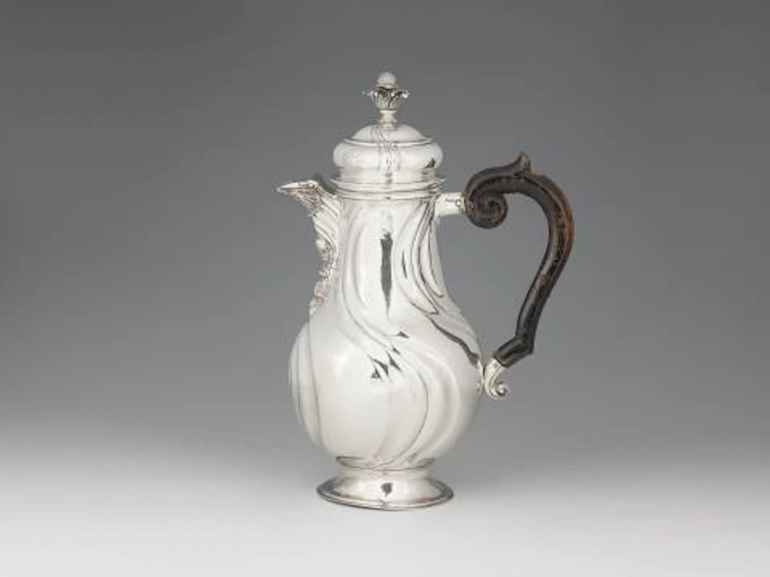 A large Norden silver coffee pot