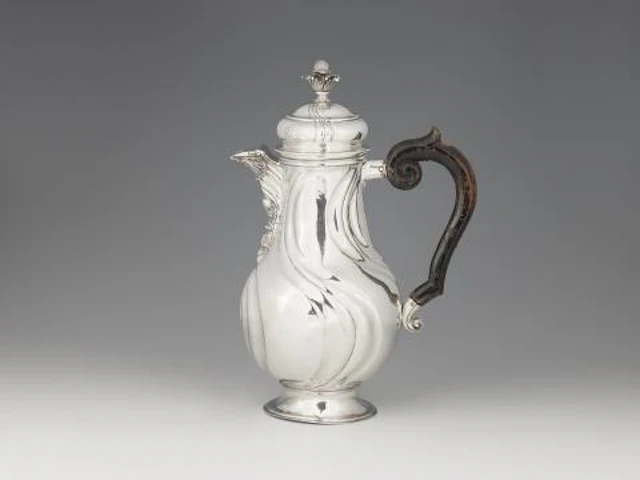 A large Norden silver coffee pot