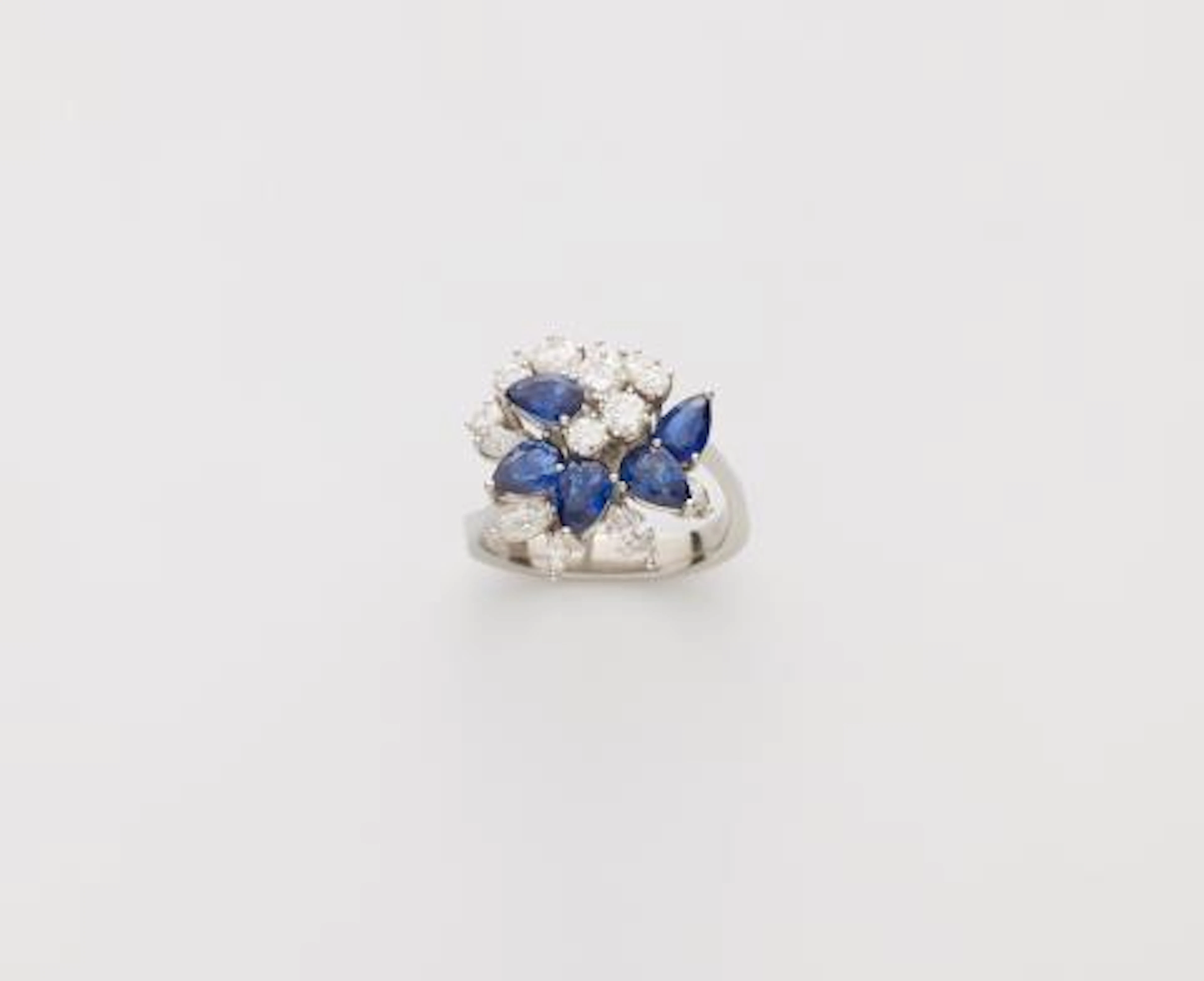 A platinum sapphire and diamond cocktail ring.