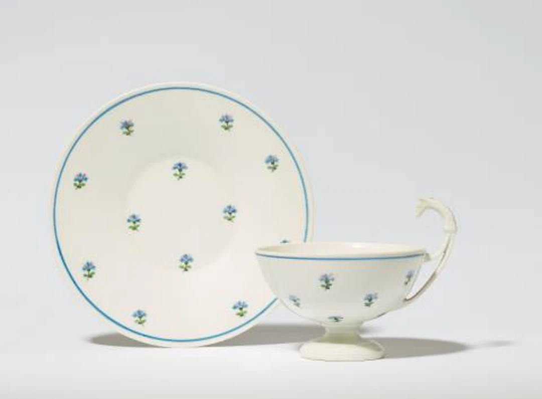 A rare Vienna porcelain bowl on stand painted with carnations
