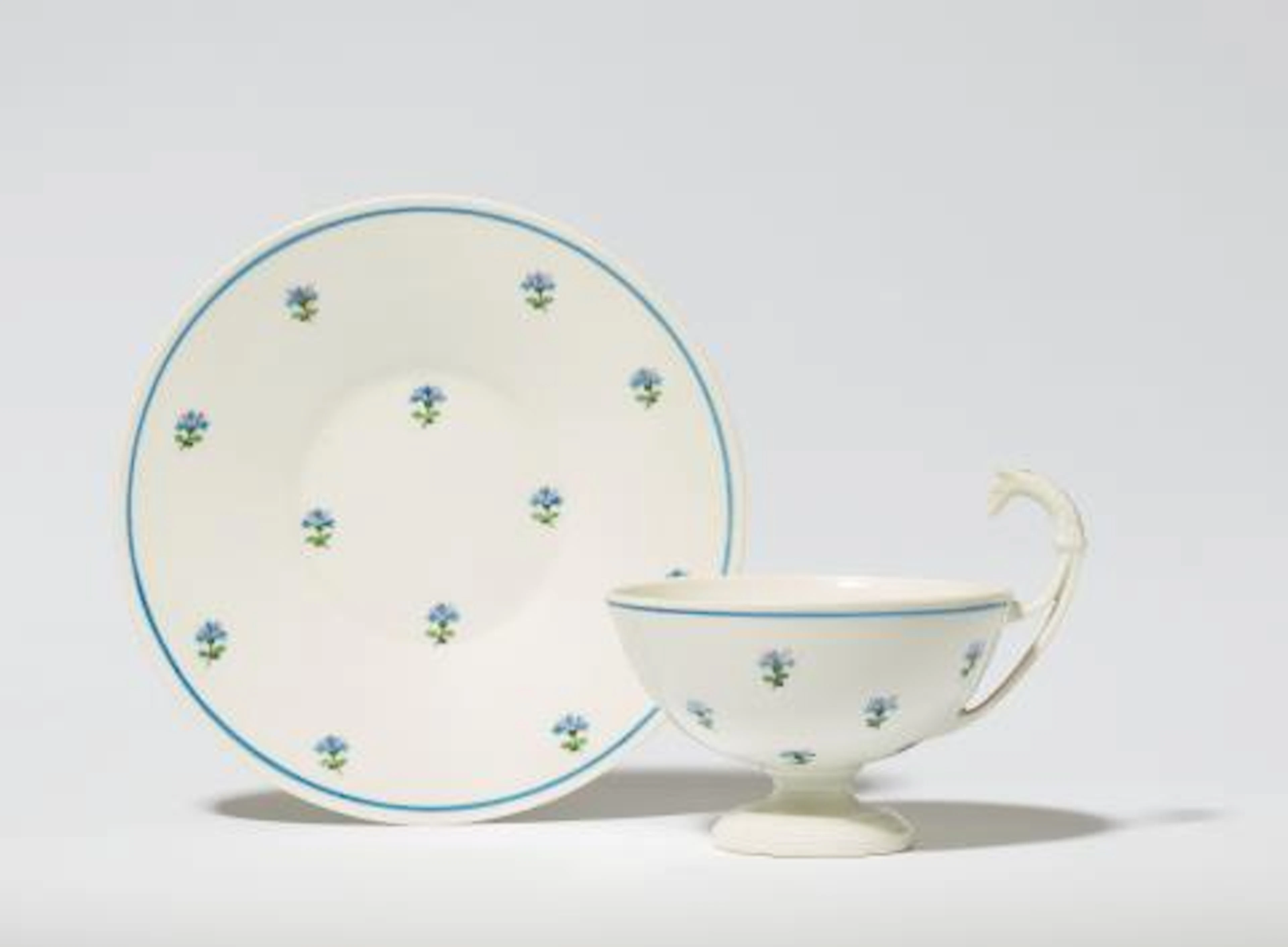 A rare Vienna porcelain bowl on stand painted with carnations