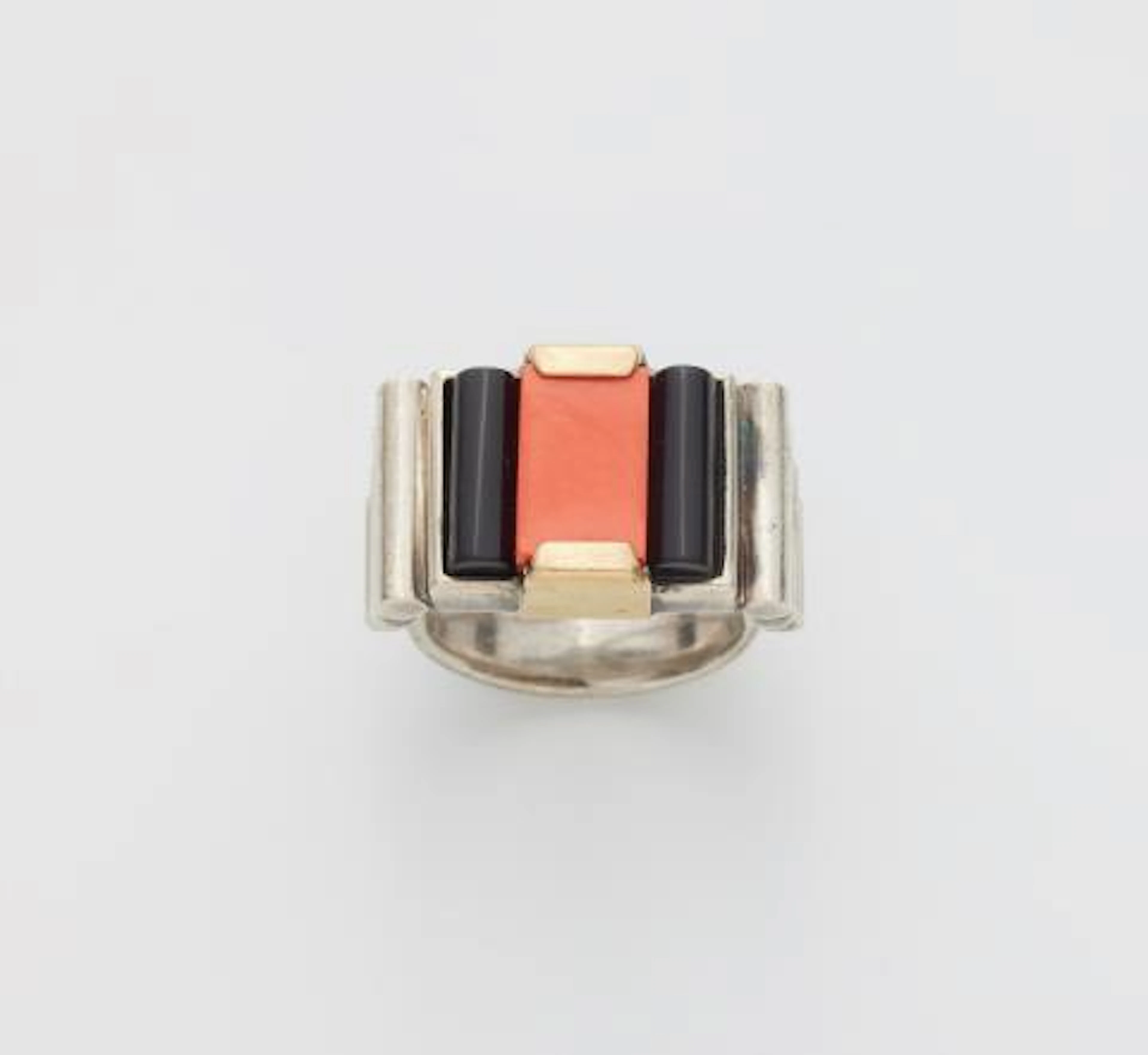 A French gold plated silver onyx and Mediterranian coral Art Déco Ring.