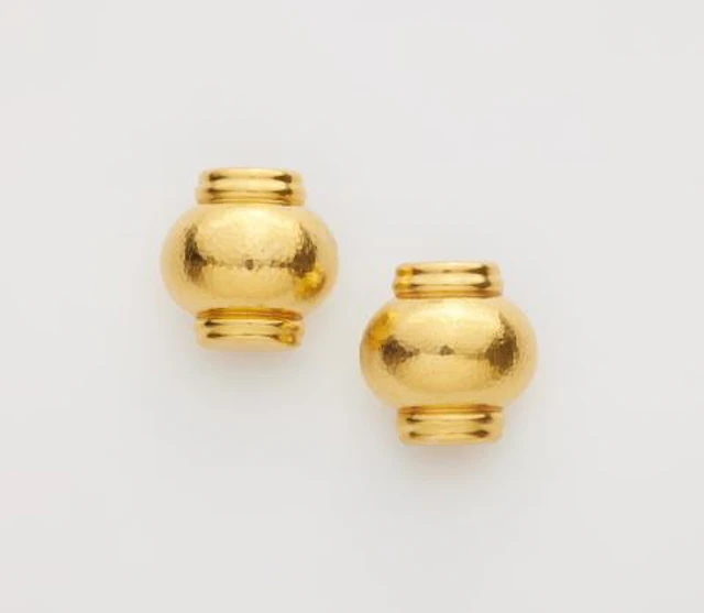 A pair of hammered 18k yellow gold clip earrings.