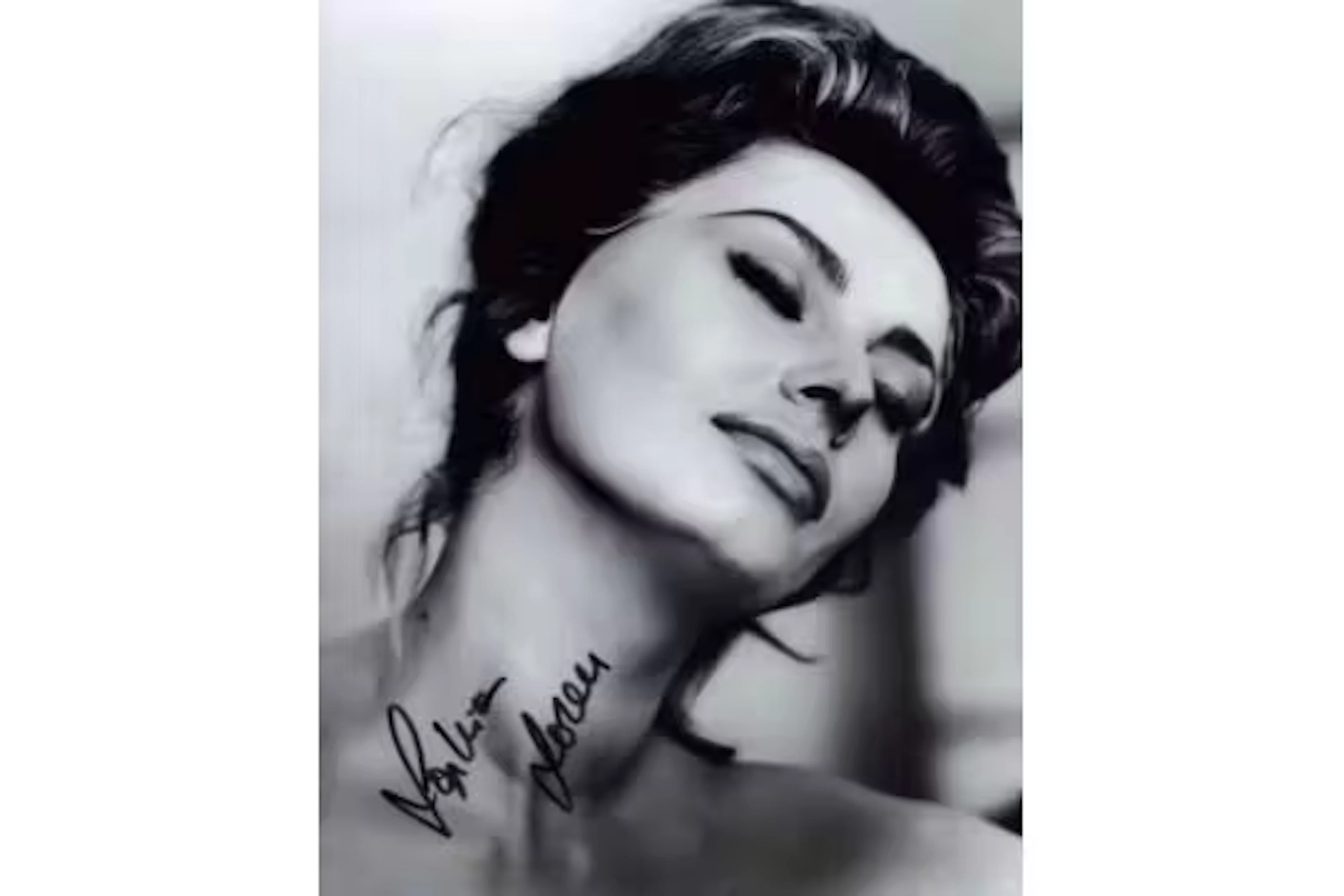 Sophia Loren signed 10x8 inch black and white photo. Good condition.