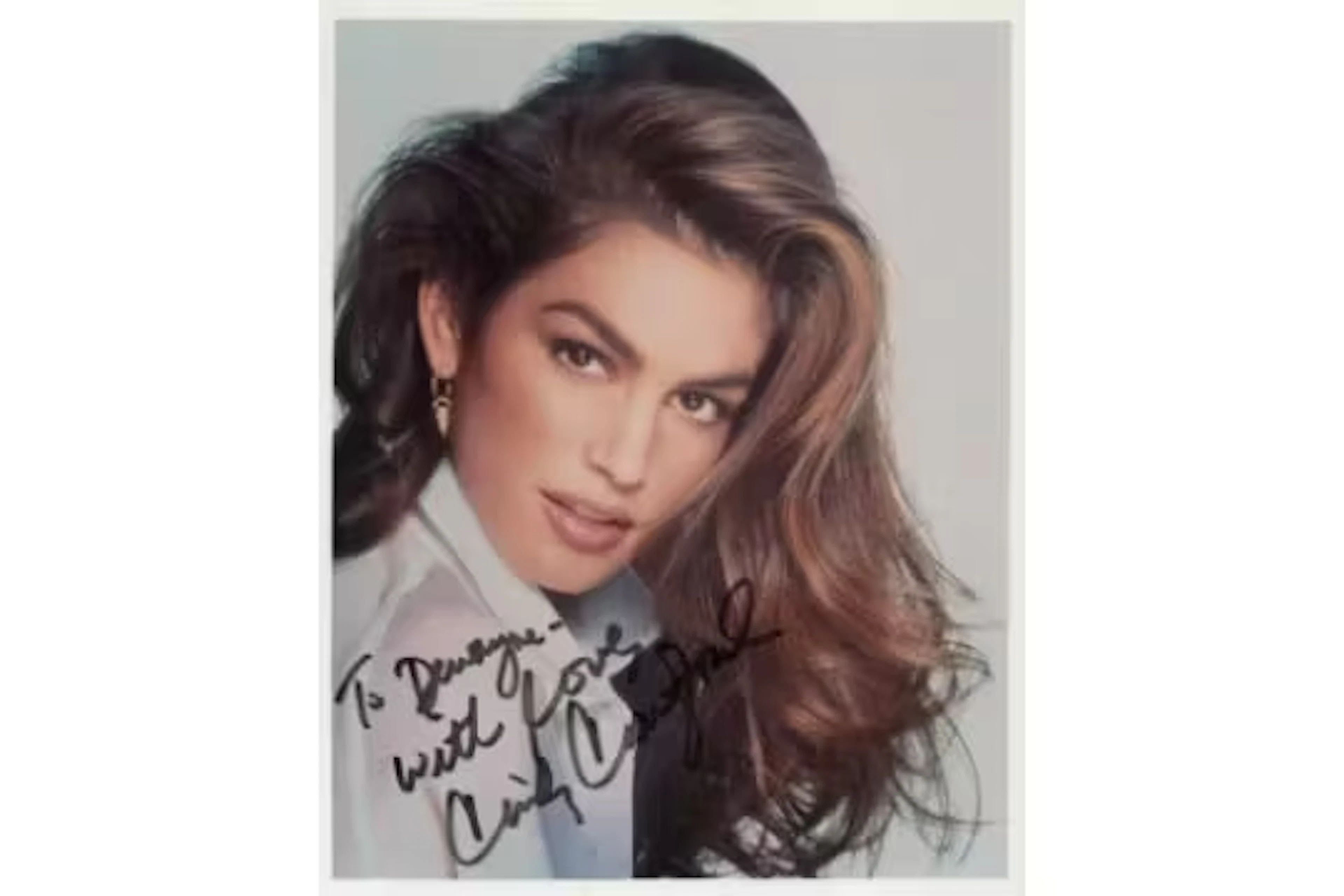 Cindy Crawford signed 10x8inch colour photo dedicated. Good condition.