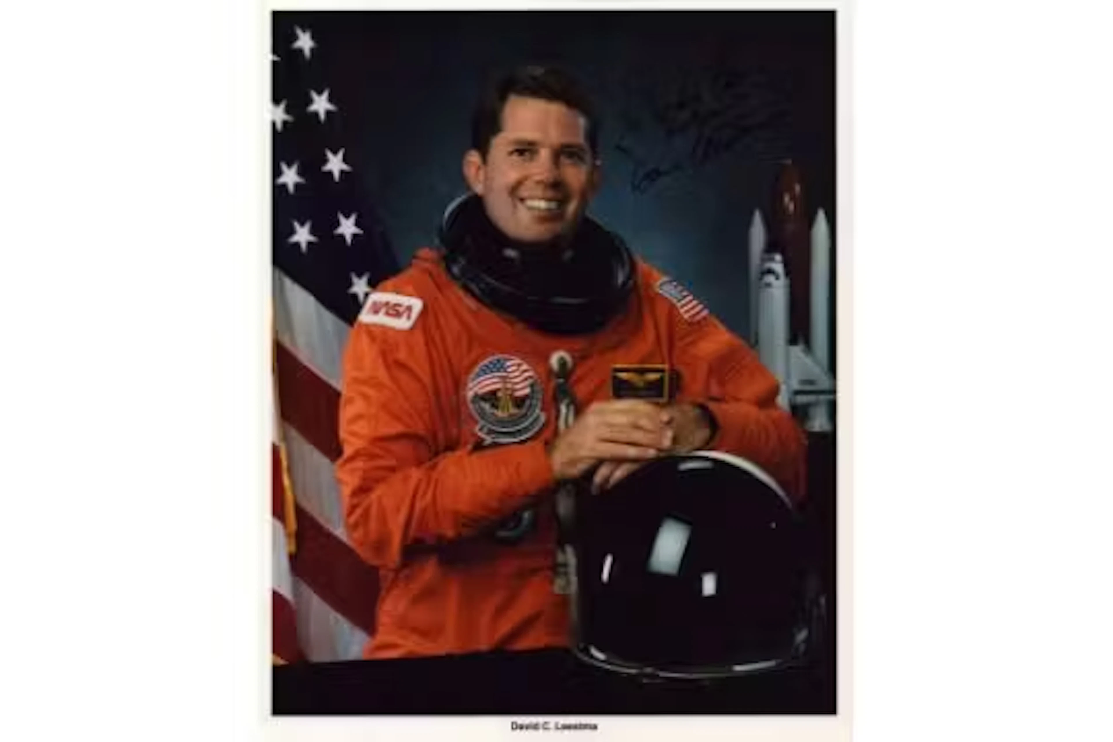 David C Leestma signed 10x8inch official NASA spacesuit photo. Dedicated.