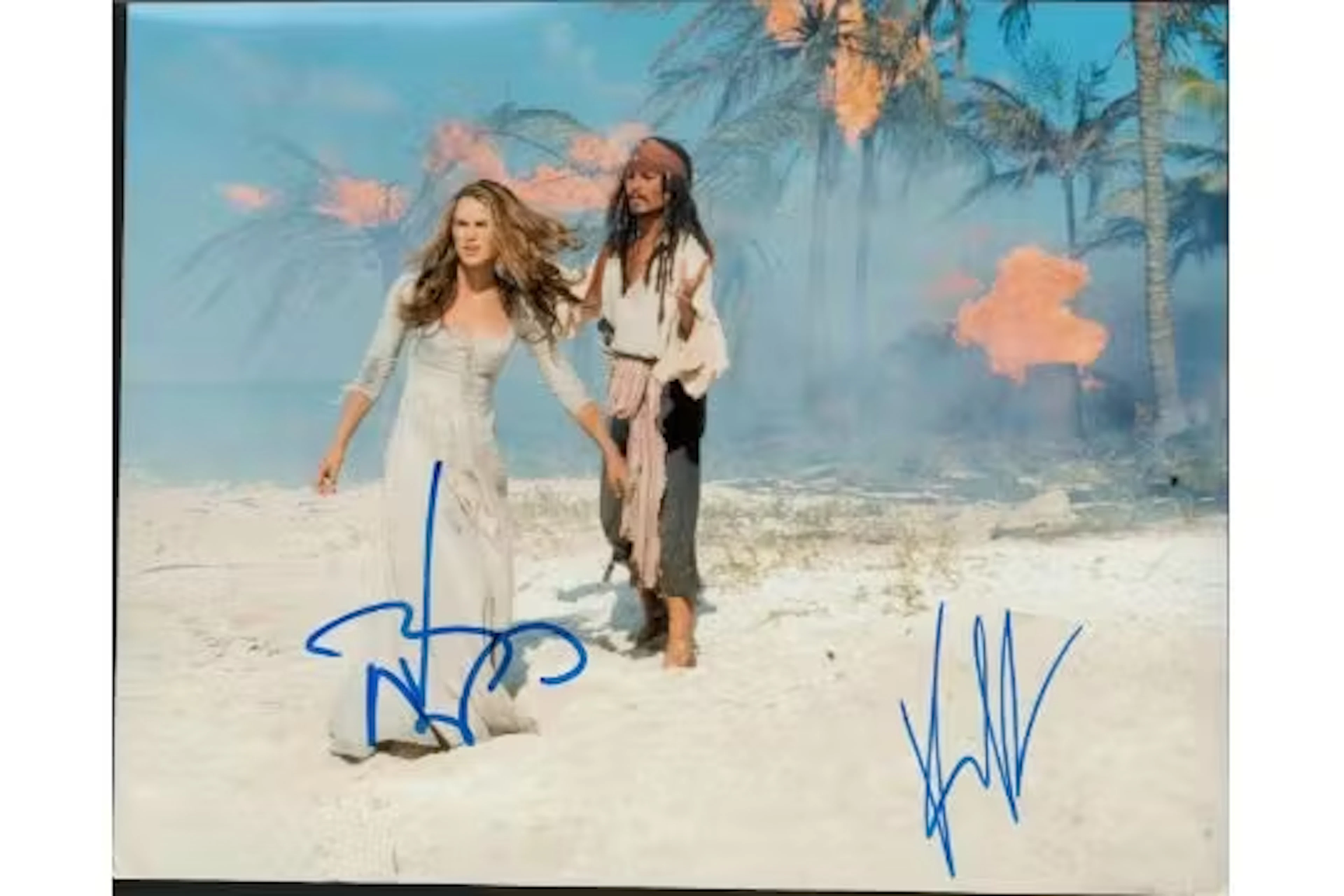 Keira Knightly and Johnny Depp signed 10x8inch colour photo. Good