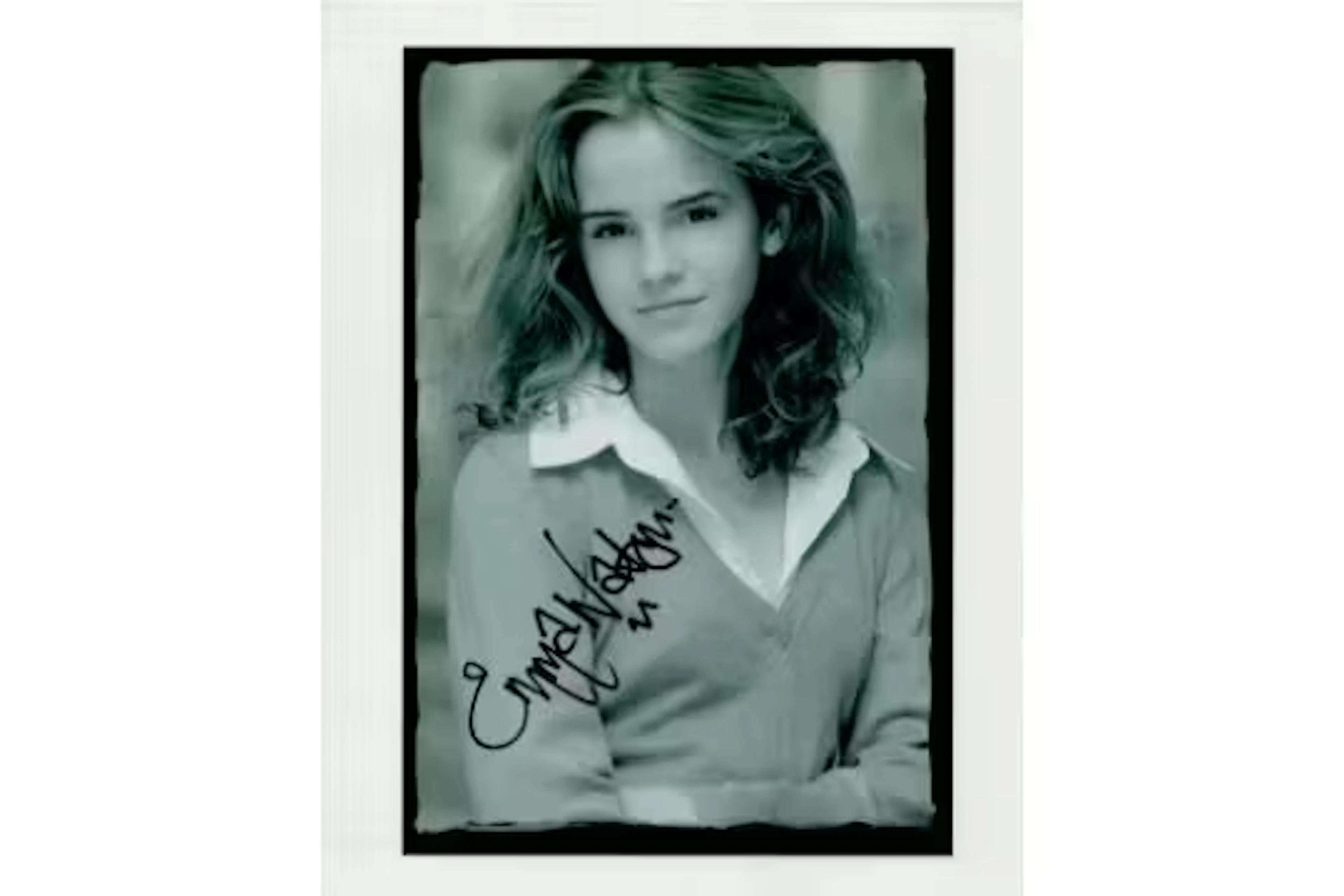 Emma Watson signed 10x8inch black and white photo. Good condition.