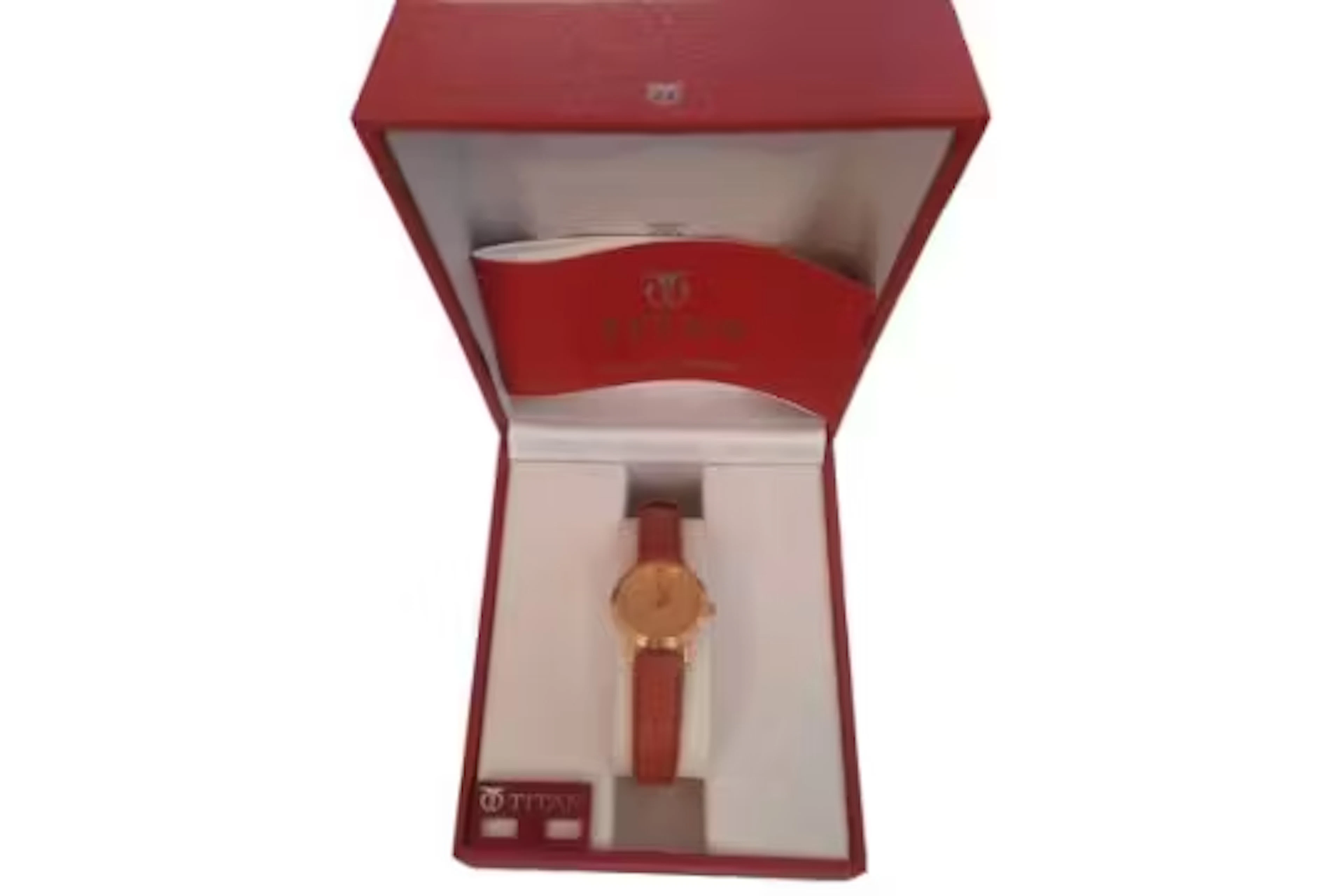 Titan classic Watch in original Titan stamped box, the watch has brown