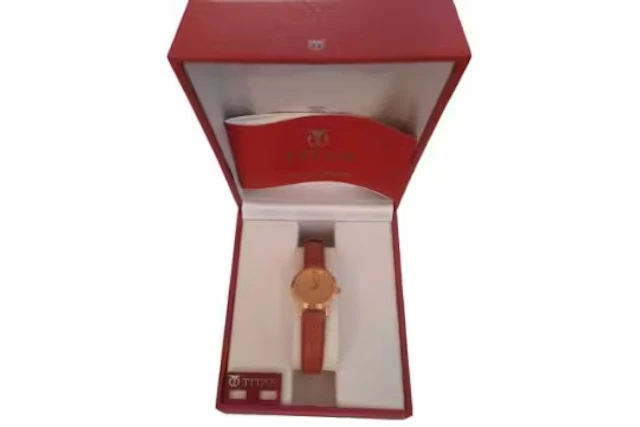 Titan classic Watch in original Titan stamped box, the watch has brown
