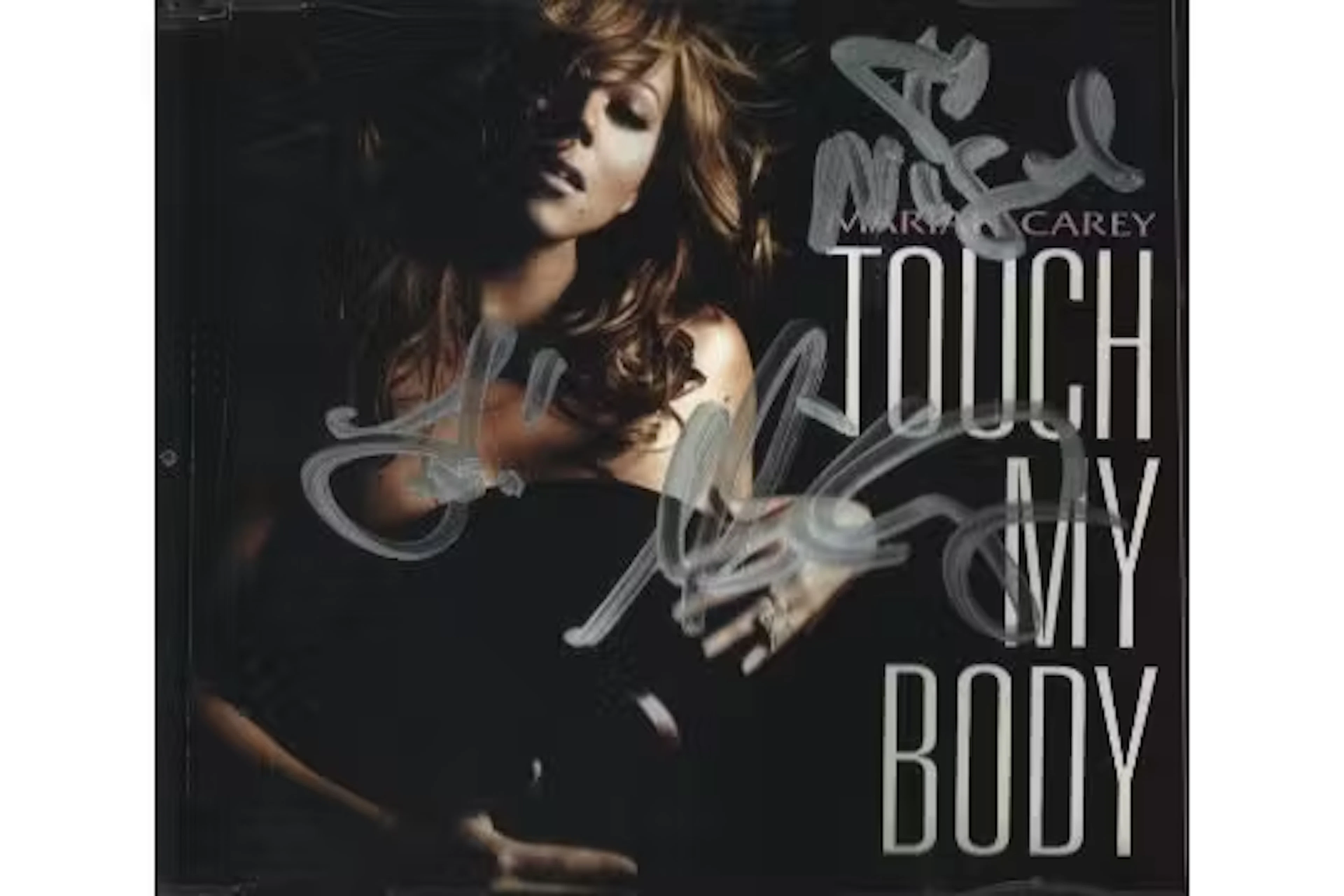 Mariah Carey signed sleeve includes CD 'Touch My Body'. Good condition.