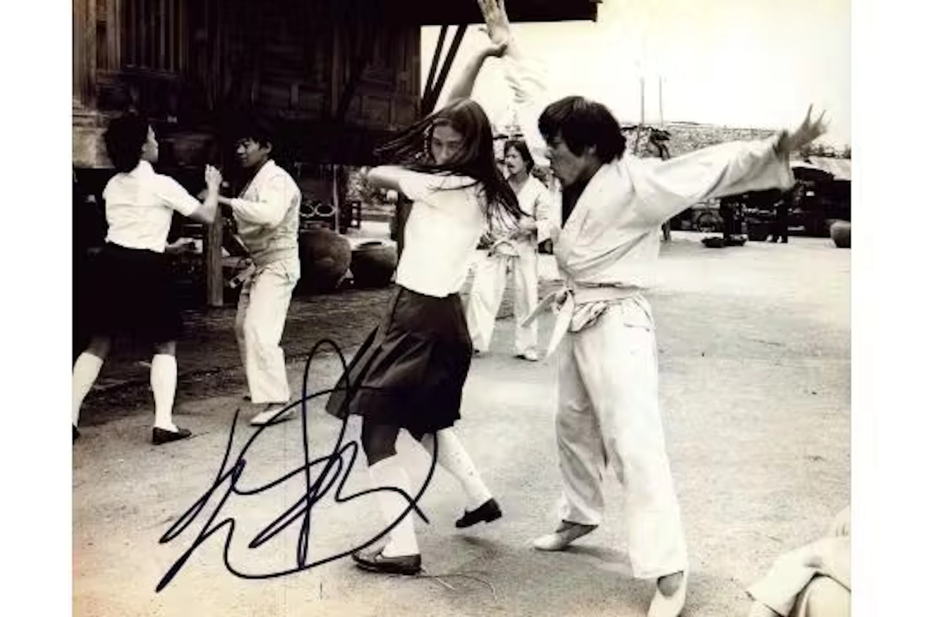 Qui Yuen signed 10x8inch black and white photo from The Man with the