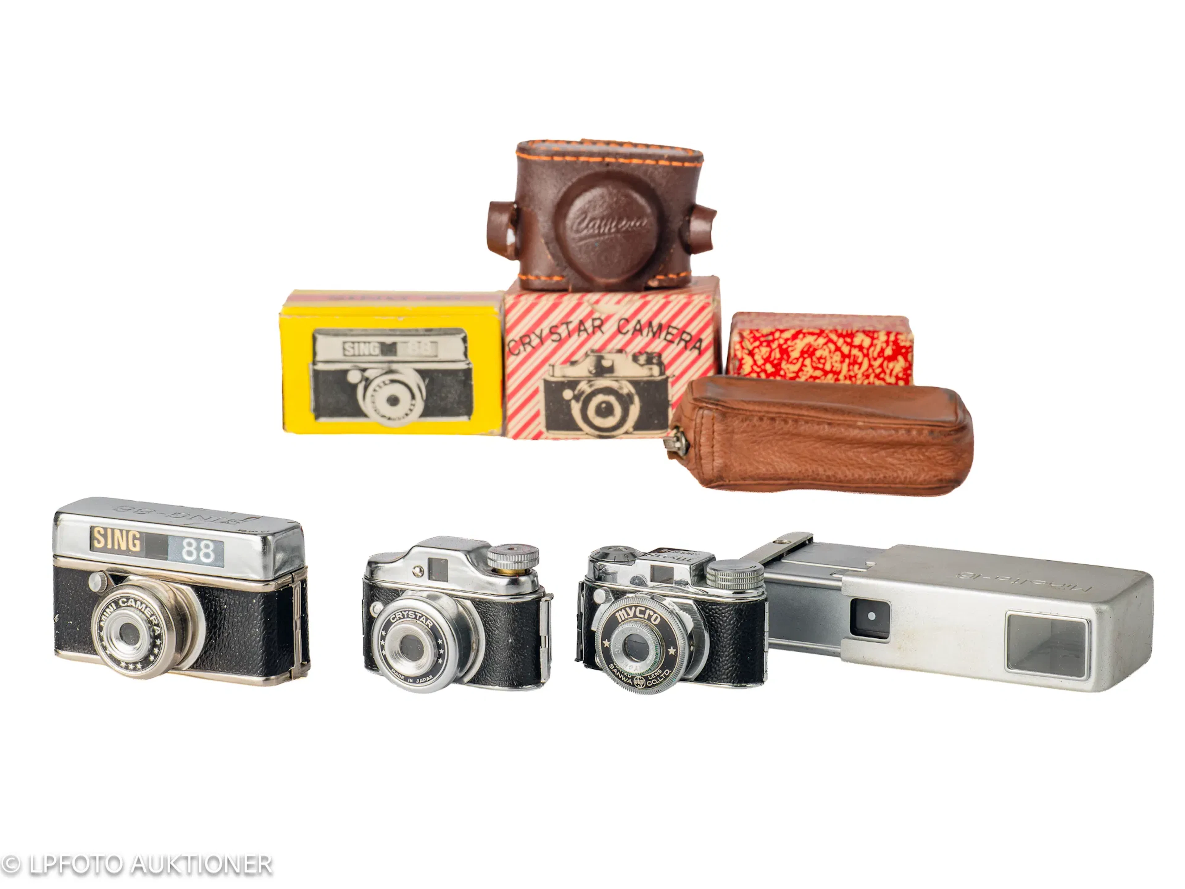 Lot with four "Hit-type" subminiature cameras