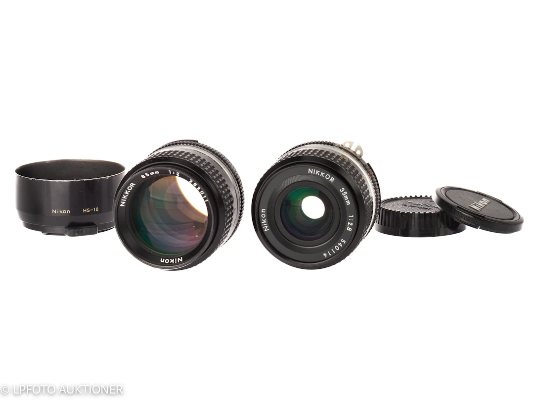 Lot with two Nikkor lenses