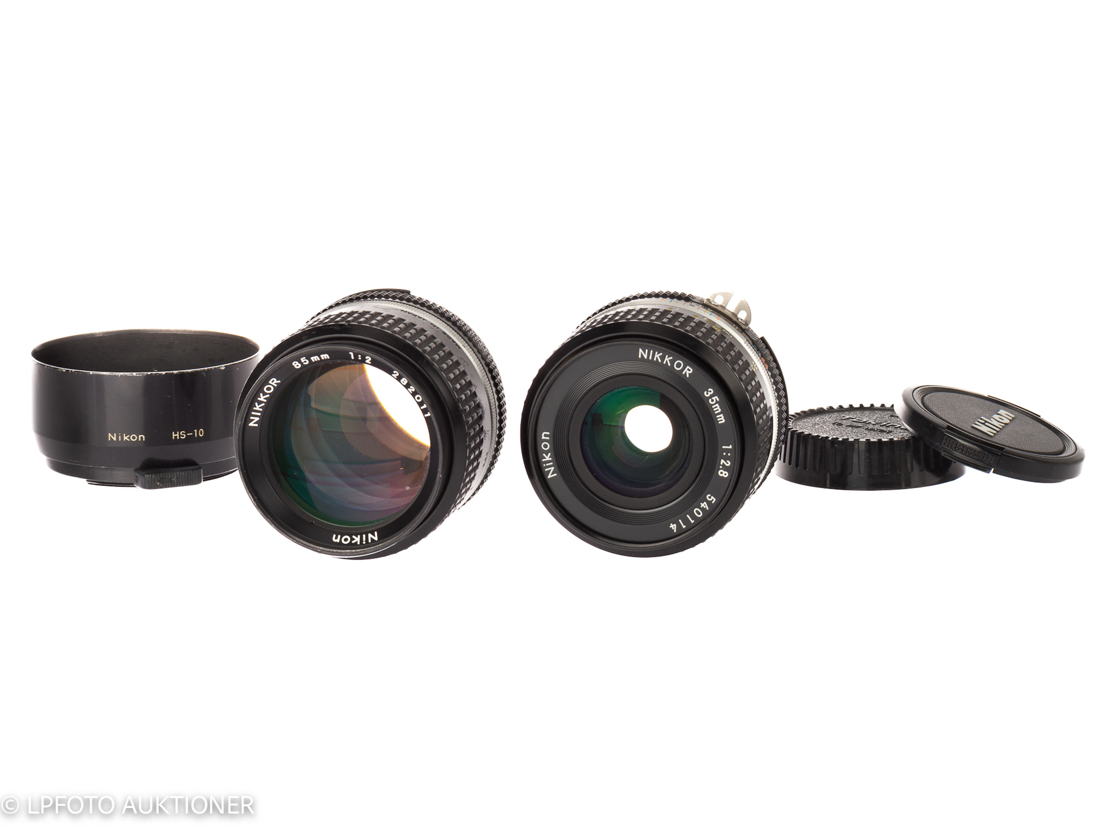 Lot with two Nikkor lenses