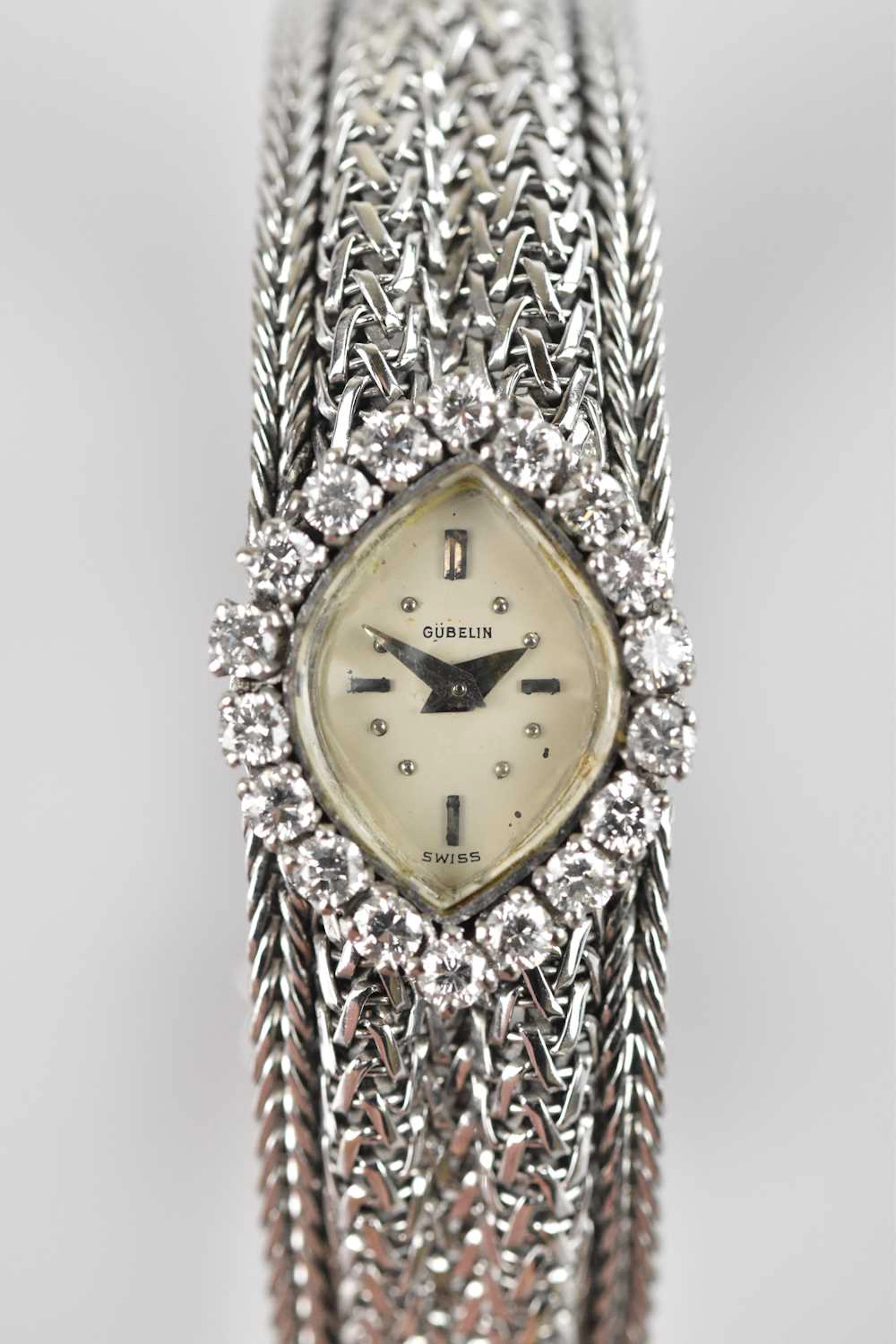 GUBELIN; a lady's cocktail watch with diamond set bezel...