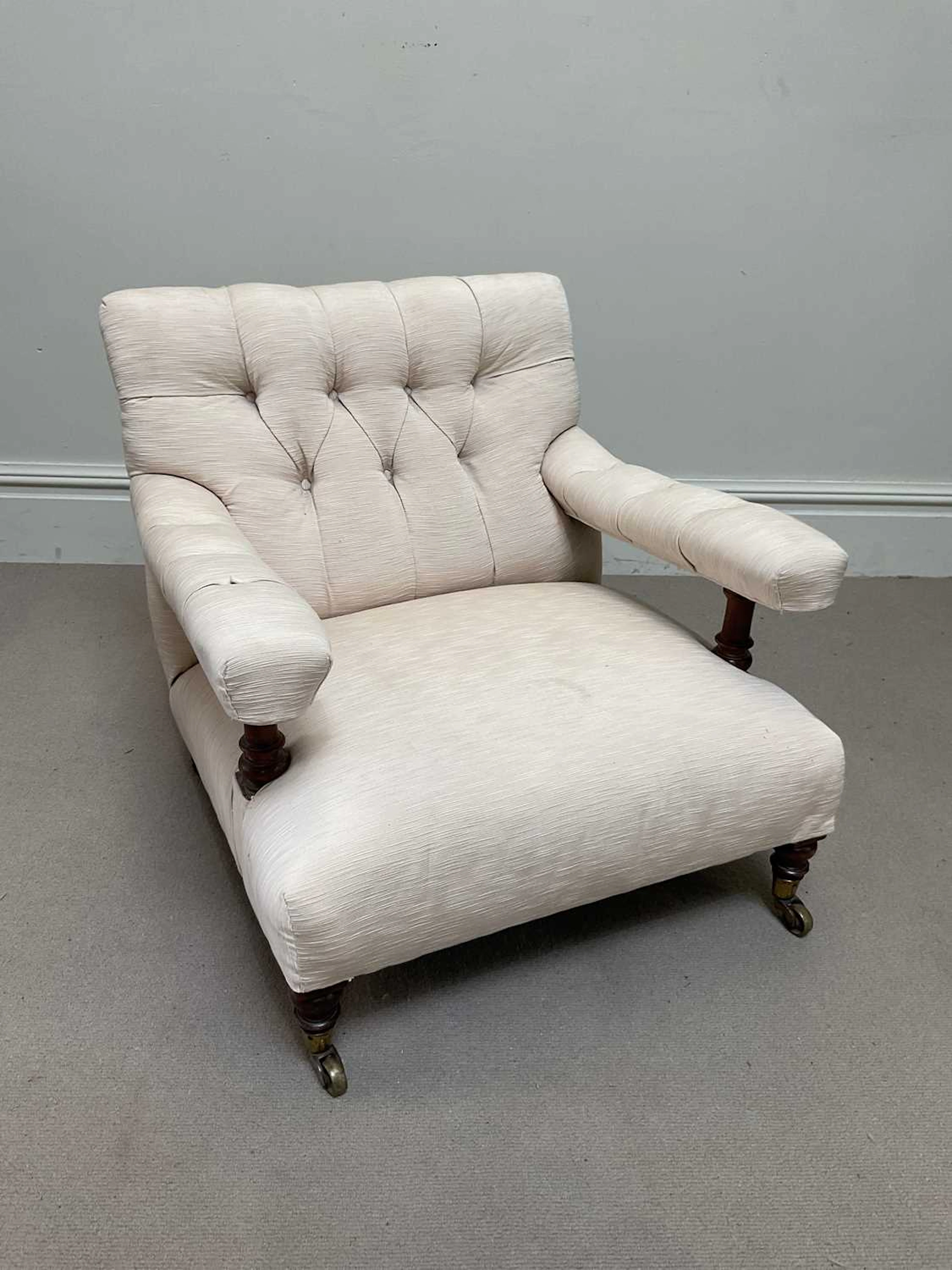 A library chair in the manner of Howard & Sons