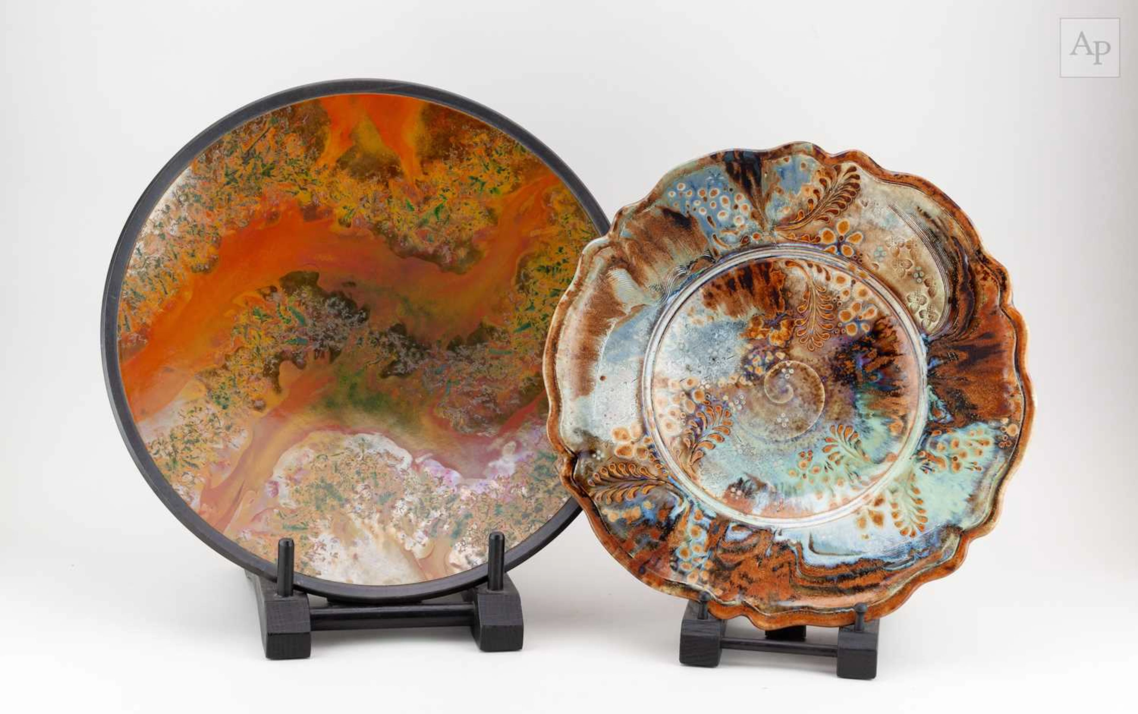 ANDREW HILL (born 1964); a raku charger covered in burnt...
