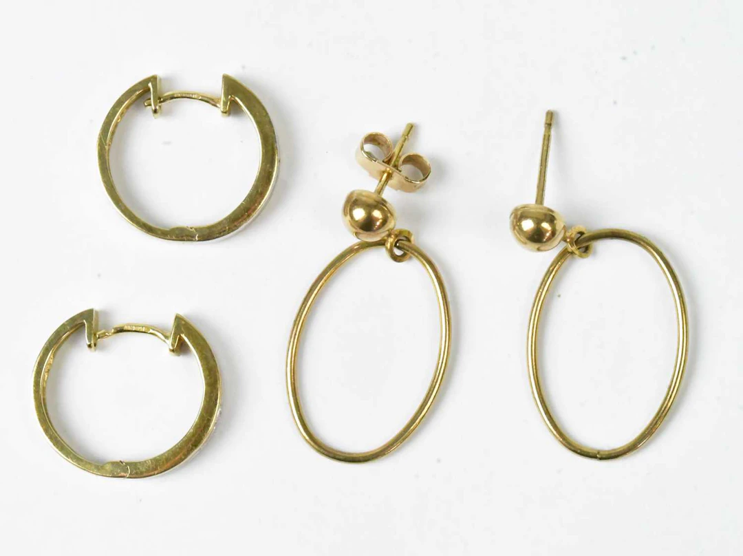 A pair of 9ct yellow and white gold hoop earrings