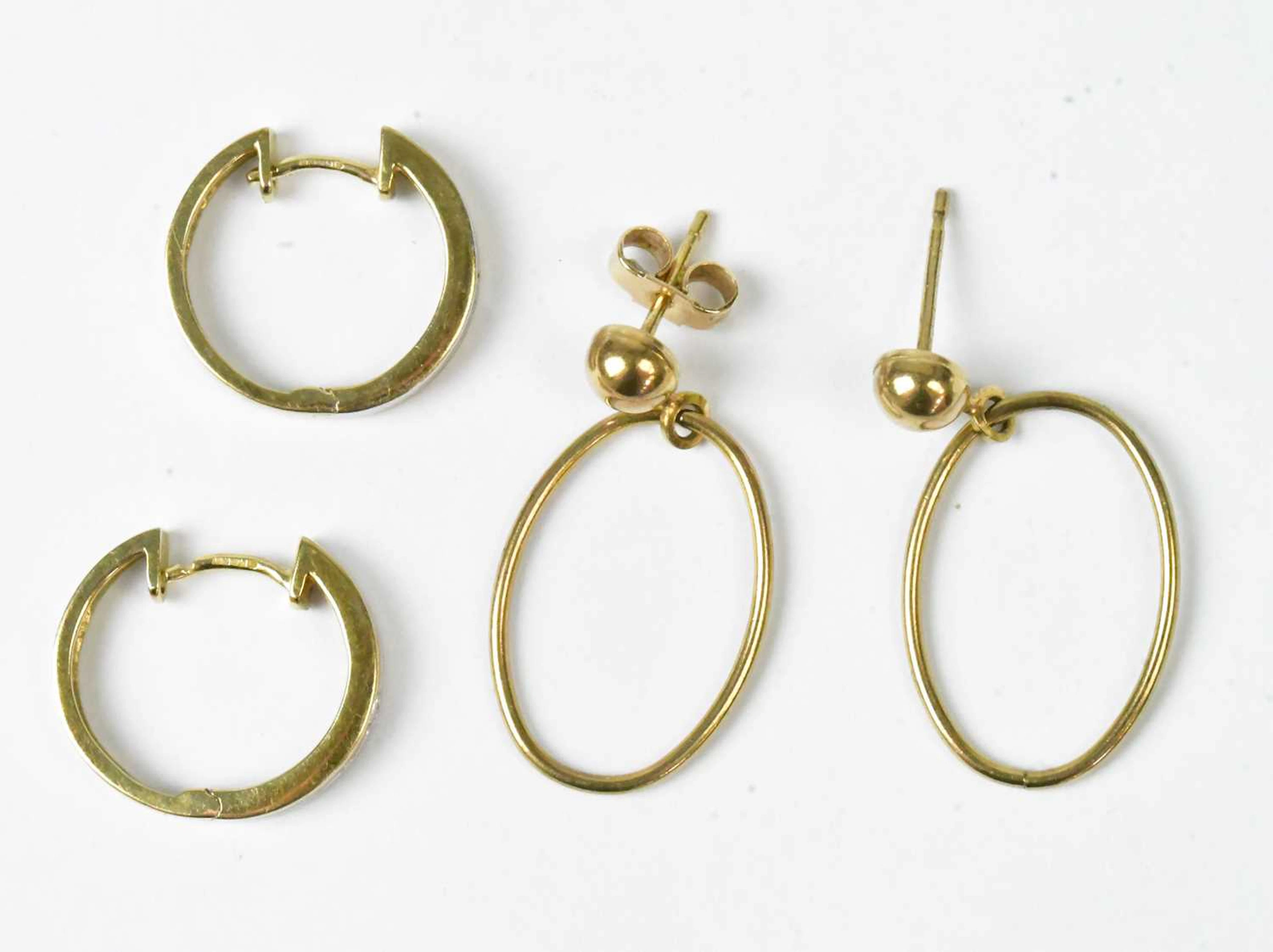 A pair of 9ct yellow and white gold hoop earrings