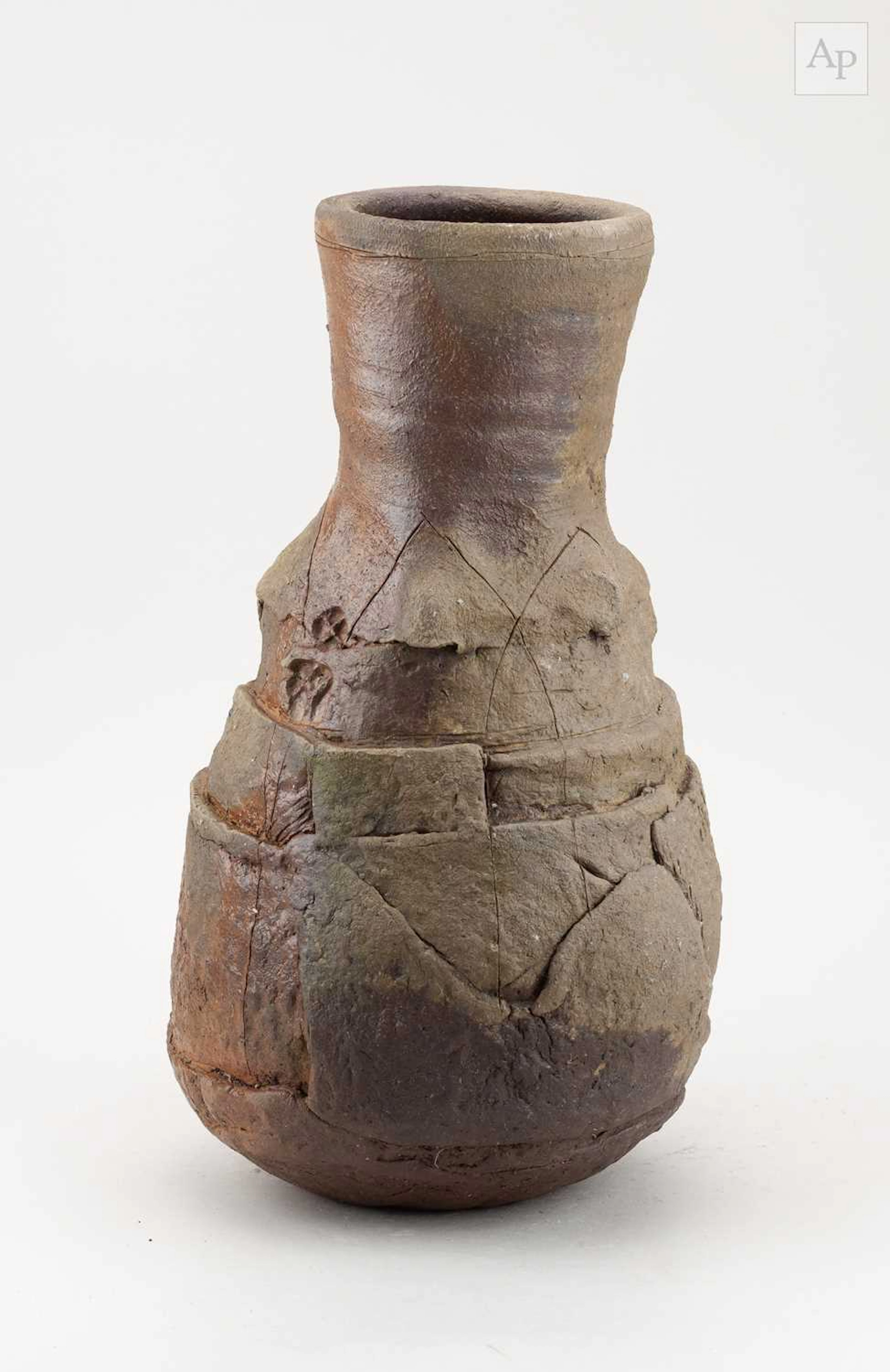 CHARLES BOUND (born 1939); a wood fired stoneware bottle...