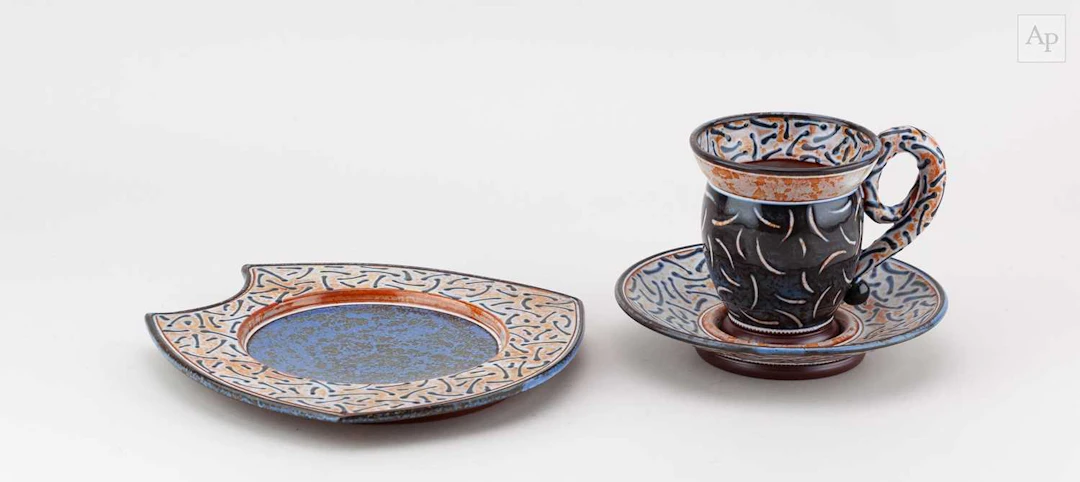 MORGEN HALL (1960-2016); a tin-glazed earthenware plate with cobalt decoration