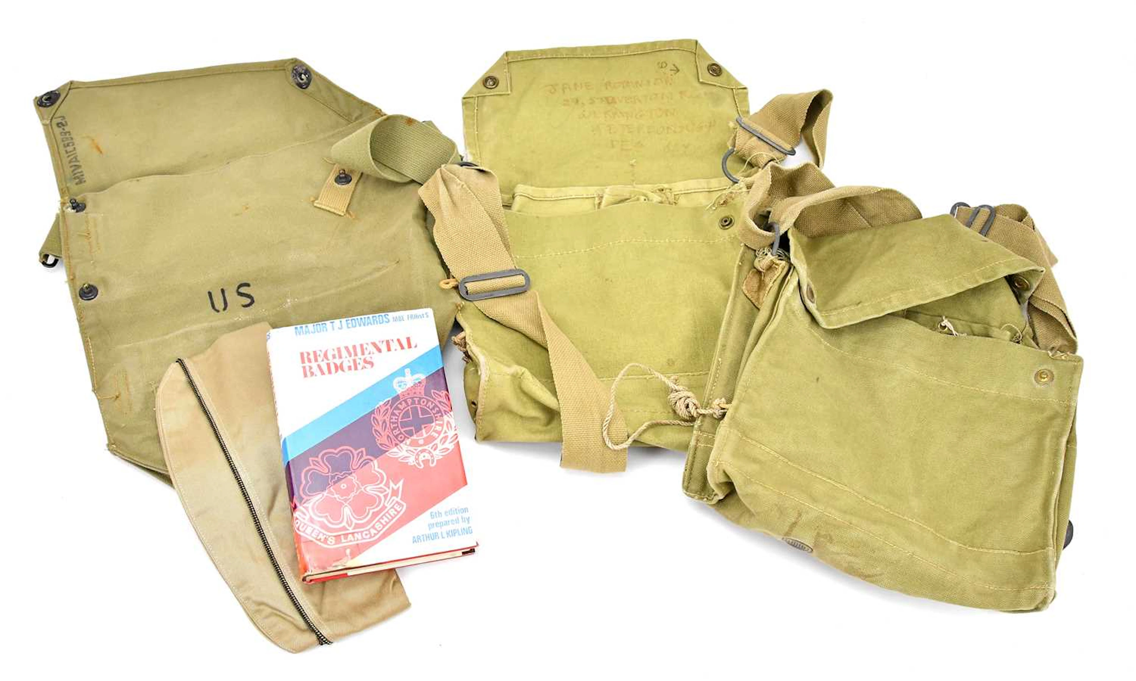 A group of WWII gas mask canvas bags